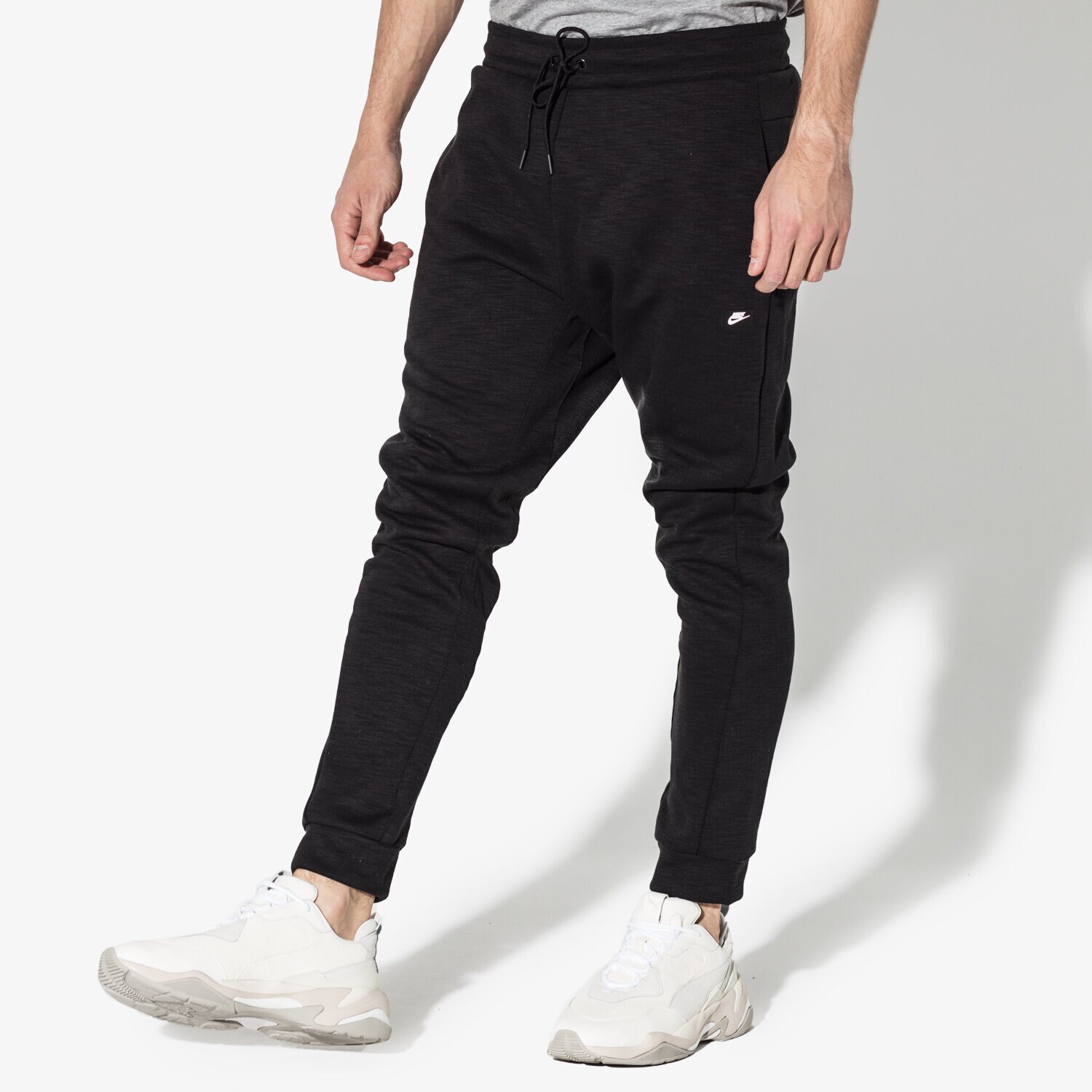 pánské kalhoty NIKE KALHOTY  M NSW OPTIC JGGR 928493-011 ČERNÁ