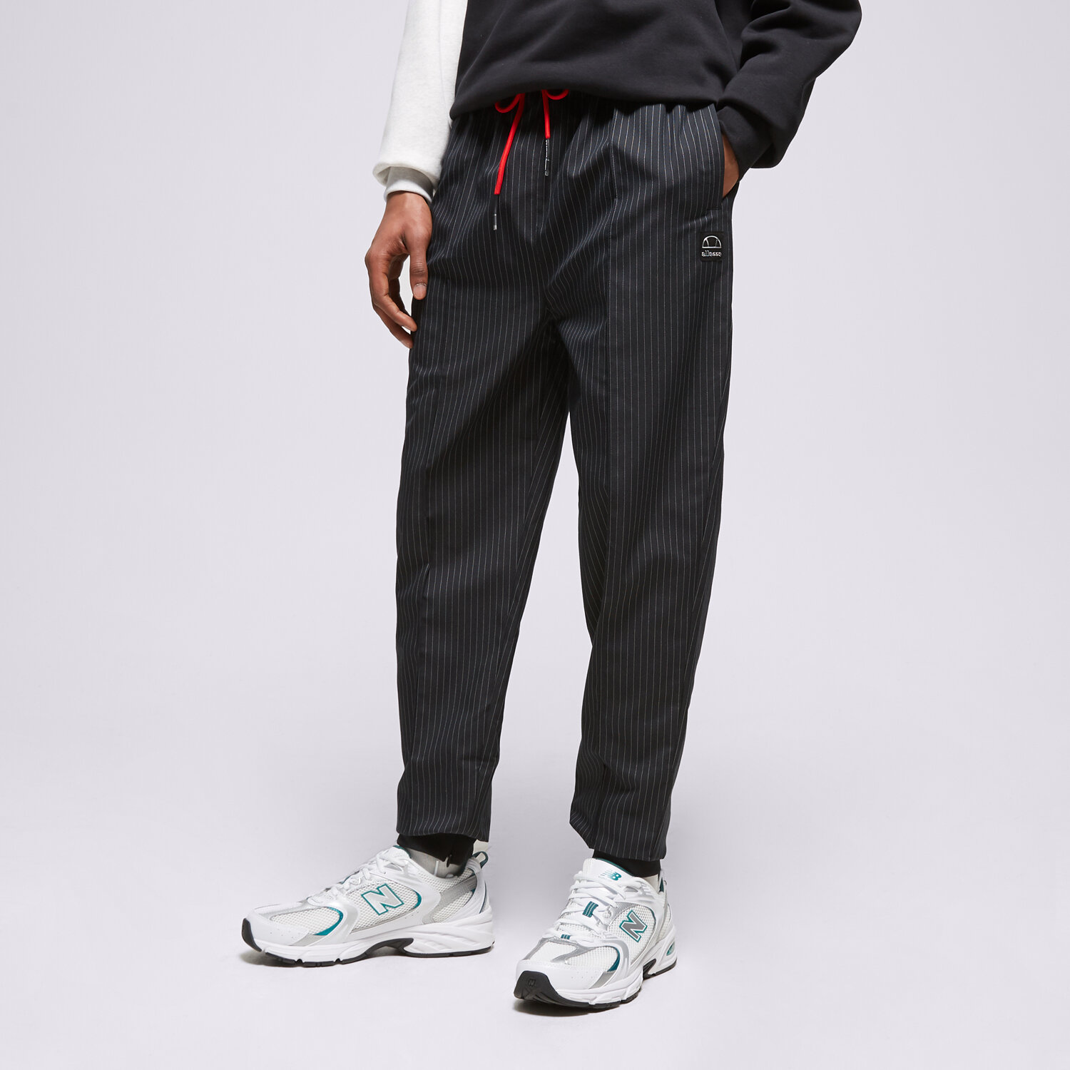 pánské kalhoty ELLESSE KALHOTY  CLIFFORD TRACK PANT BLK SHP15887011 ČERNÁ