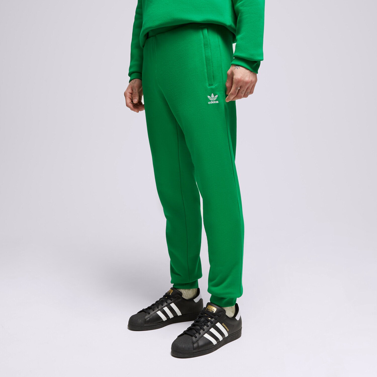 pánské kalhoty ADIDAS KALHOTY  ESSENTIALS PANT IM2102 ZELENÁ