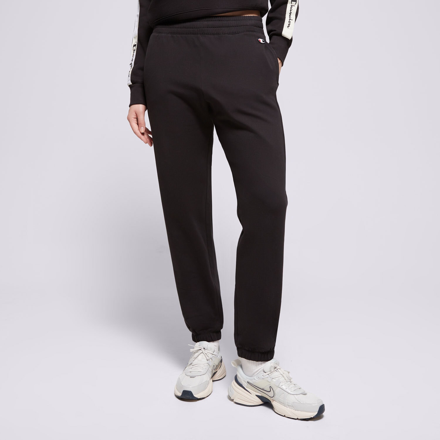 dámské kalhoty CHAMPION KALHOTY  ELASTIC CUFF PANTS 116610KK001 ČERNÁ