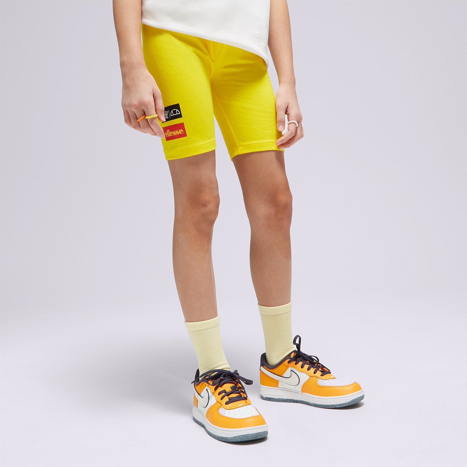 ELLESSE ŠORTKY YELLOWISH JNR SHORT YELLOW S4ML15228606 ŽLUTÁ