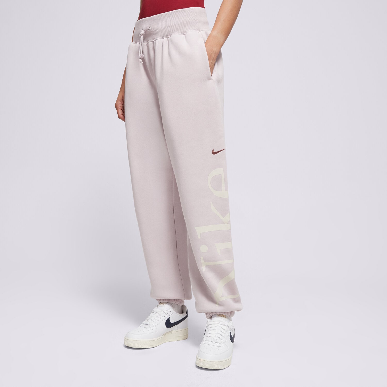 dámské kalhoty NIKE KALHOTY  W NSW PHNX FLC OS LOGO SWTPNT FN2552-019 FIALOVÁ