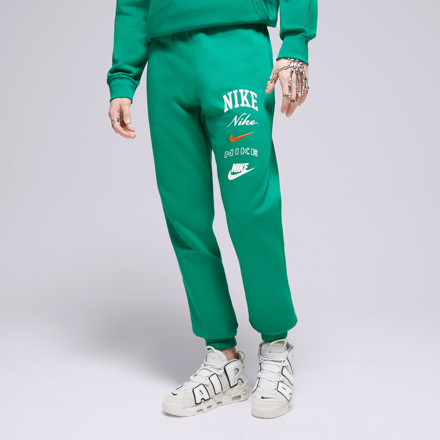 pánské kalhoty NIKE KALHOTY  M NK CLUB BB CF PANT STACK GX FN2643-365 ZELENÁ