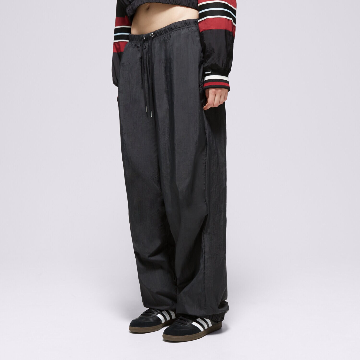 dámské kalhoty ADIDAS KALHOTY  NYLON PS PANT IT6725 ČERNÁ