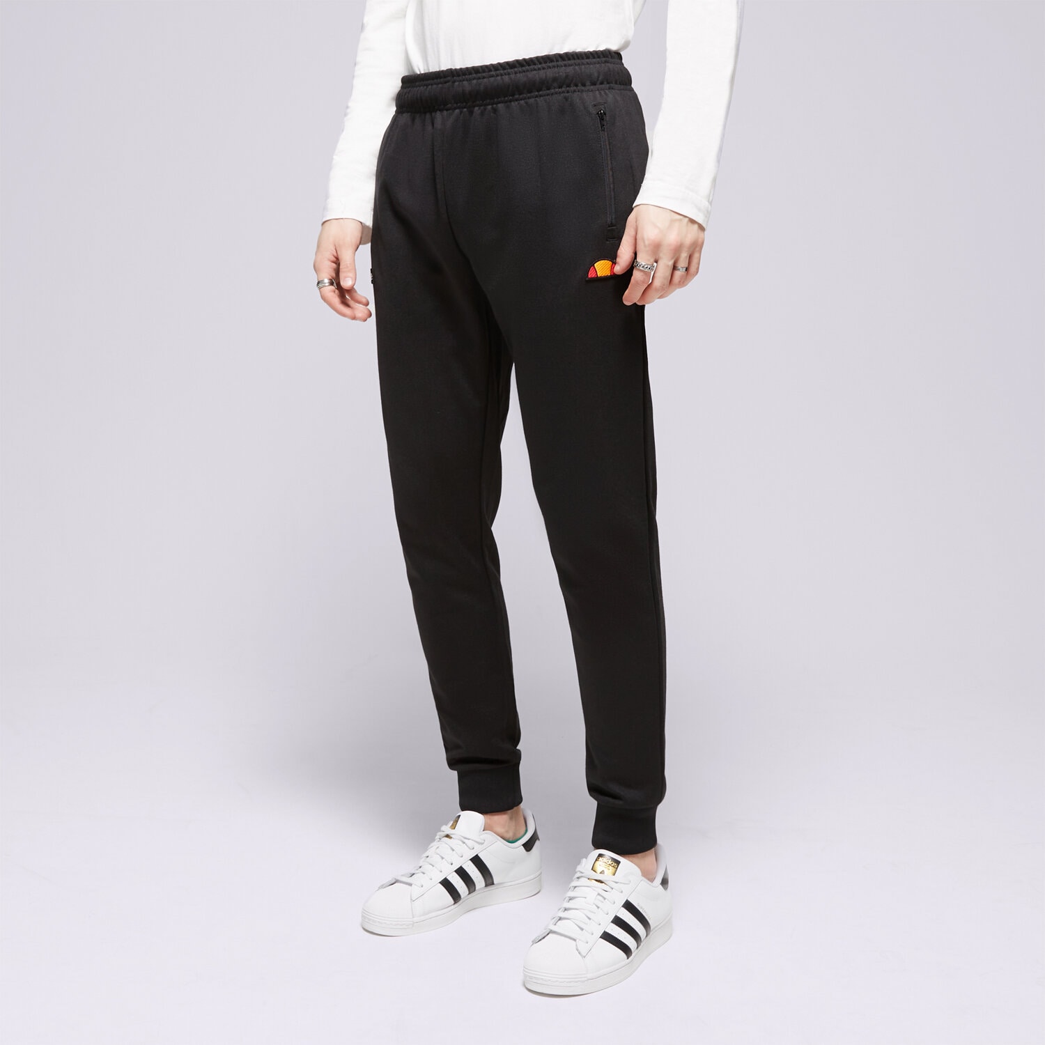 pánské kalhoty ELLESSE KALHOTY  BERTONI TRACK PANT BLK SHR04351011 ČERNÁ
