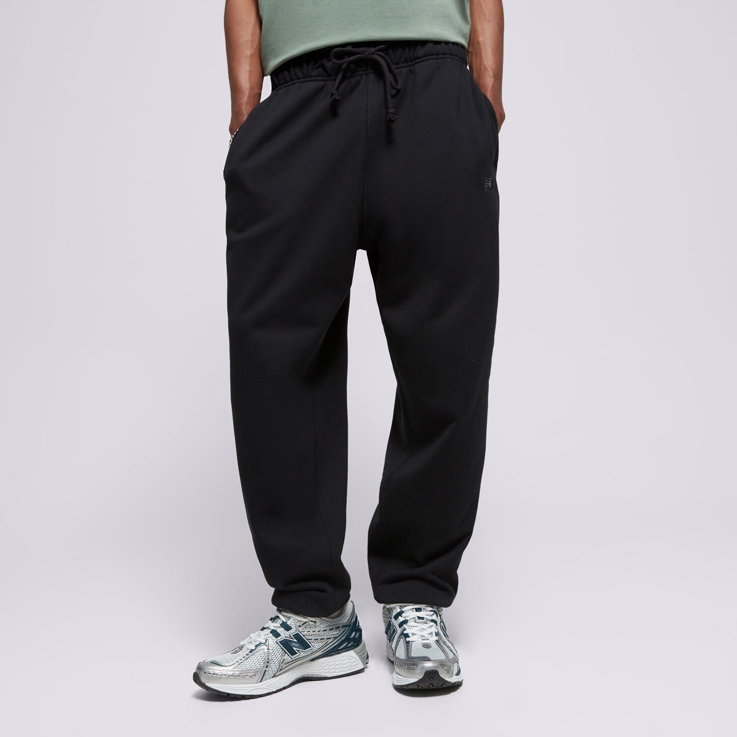 pánské kalhoty NEW BALANCE KALHOTY  ATHLETICS FRENCH TERRY JOGGER MP41508BK ČERNÁ