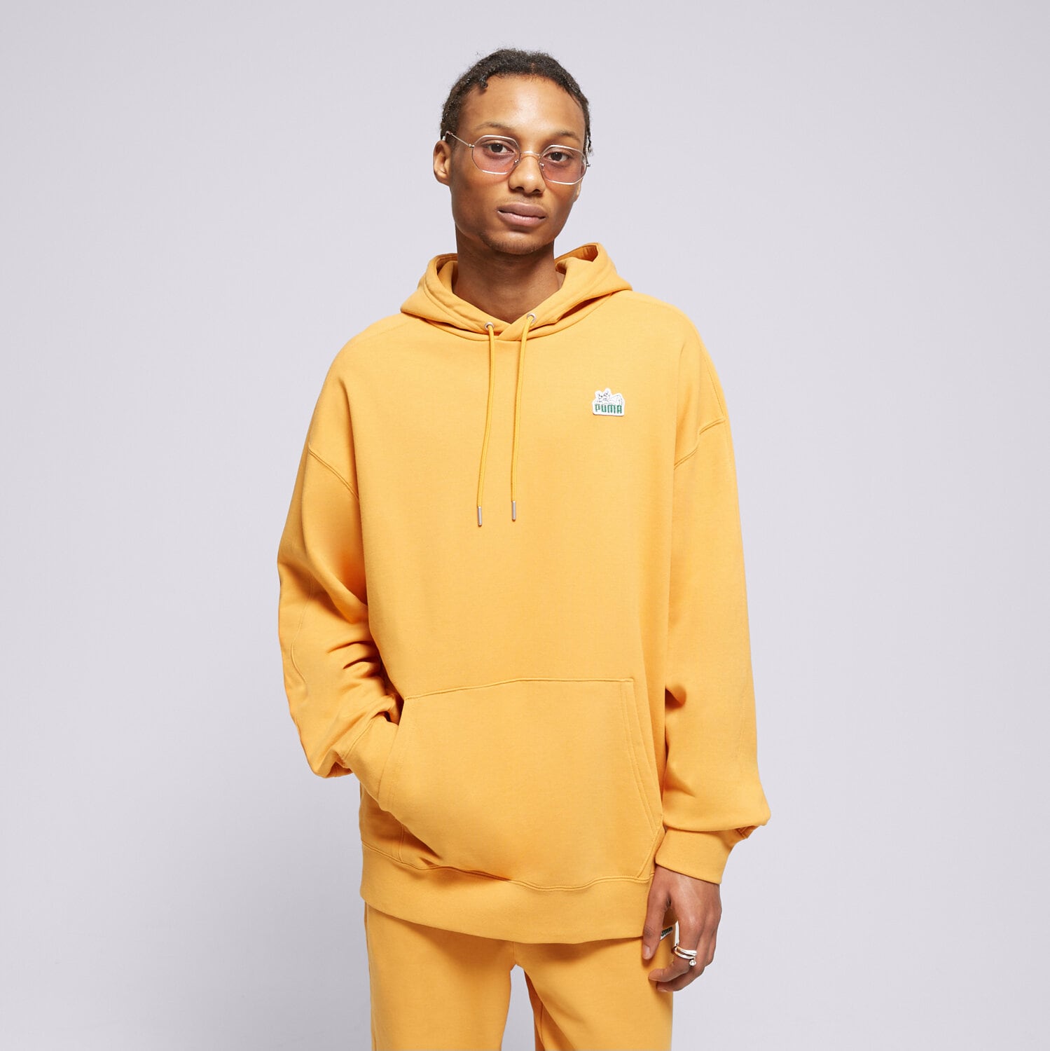 pánská mikina PUMA MIKINA S KAPUCÍ T7 FOR THE FANBASE SUPER 62503691 ORANŽOVÁ