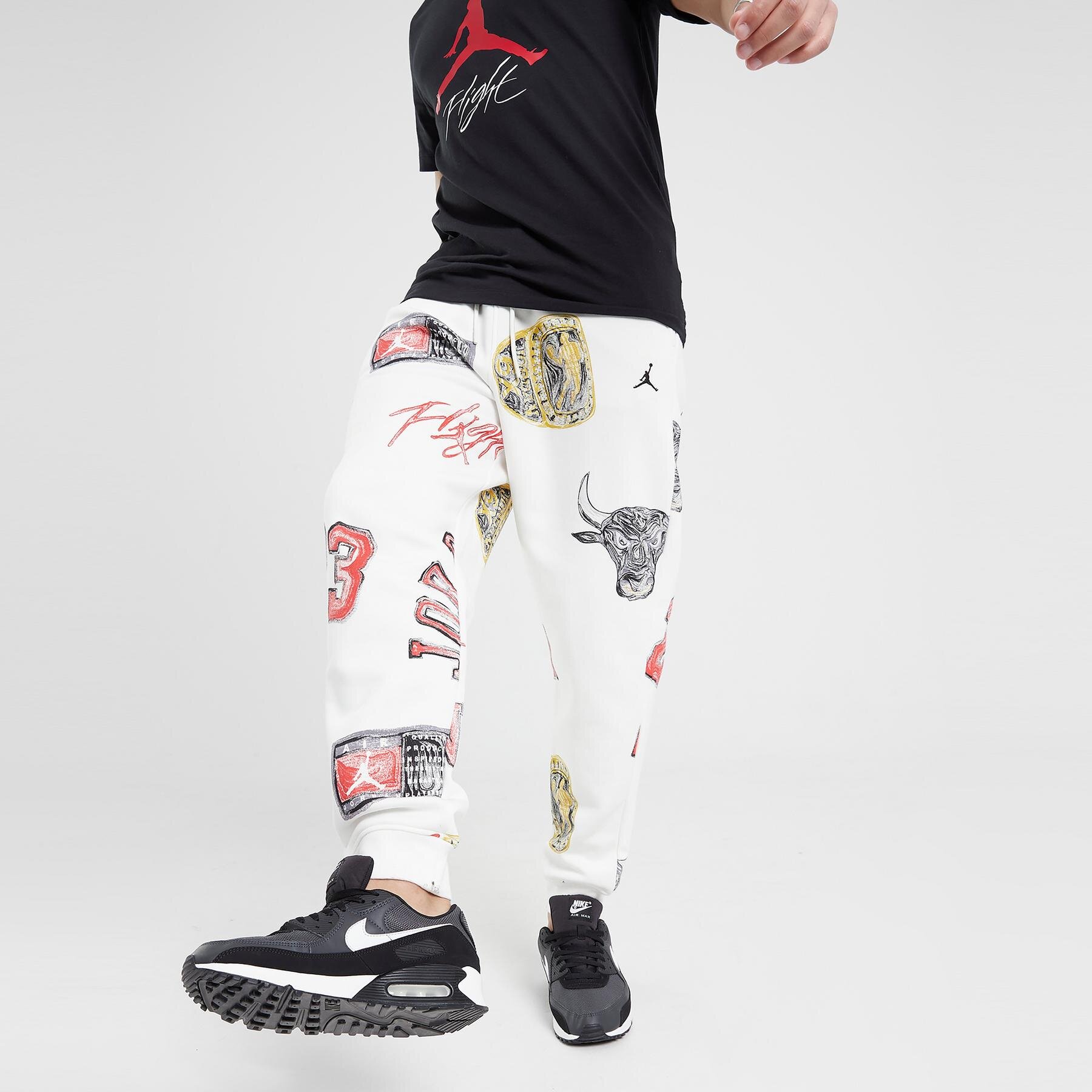 pánské kalhoty JORDAN KALHOTY  M J ESS AOP FLC PANT FN4547-133 VÍCEBAREVNÁ