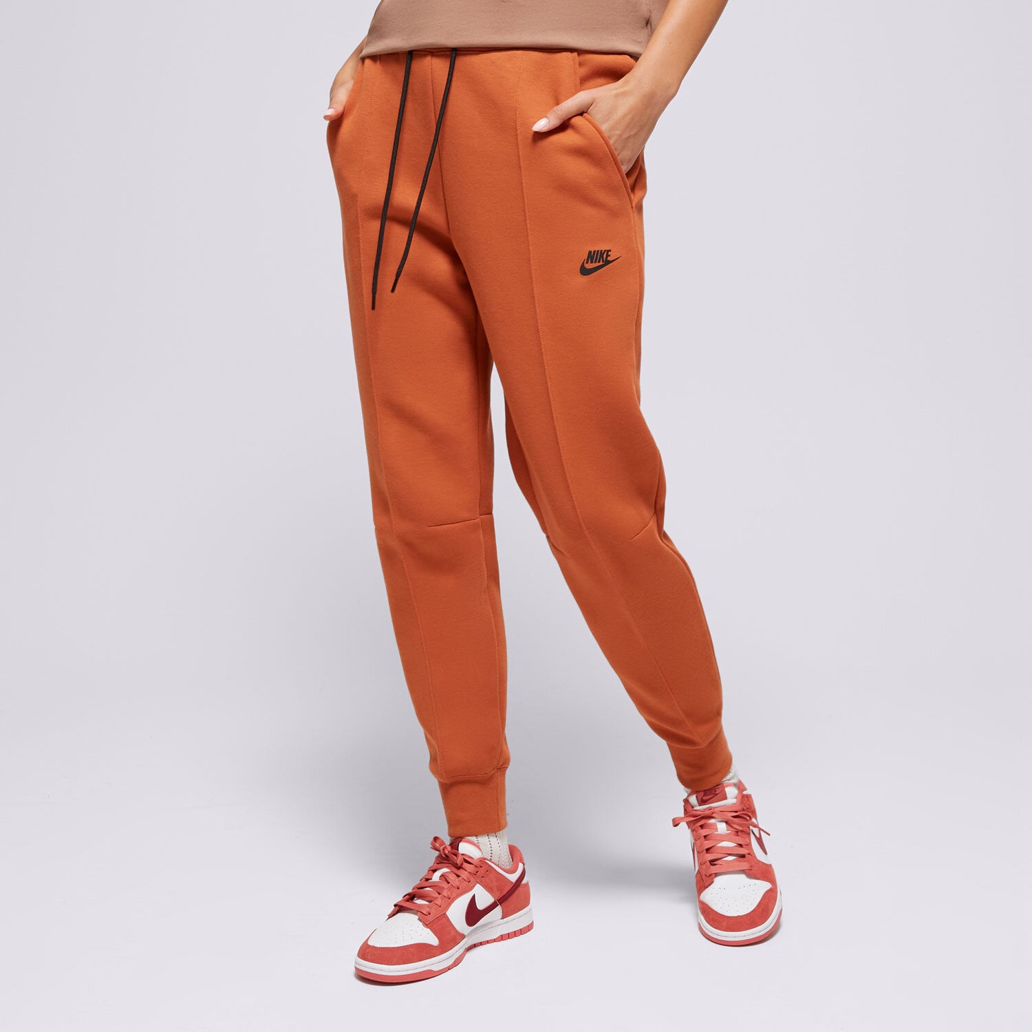 dámské kalhoty NIKE KALHOTY  W NSW TCH FLC MR JGGR FB8330-825 ORANŽOVÁ