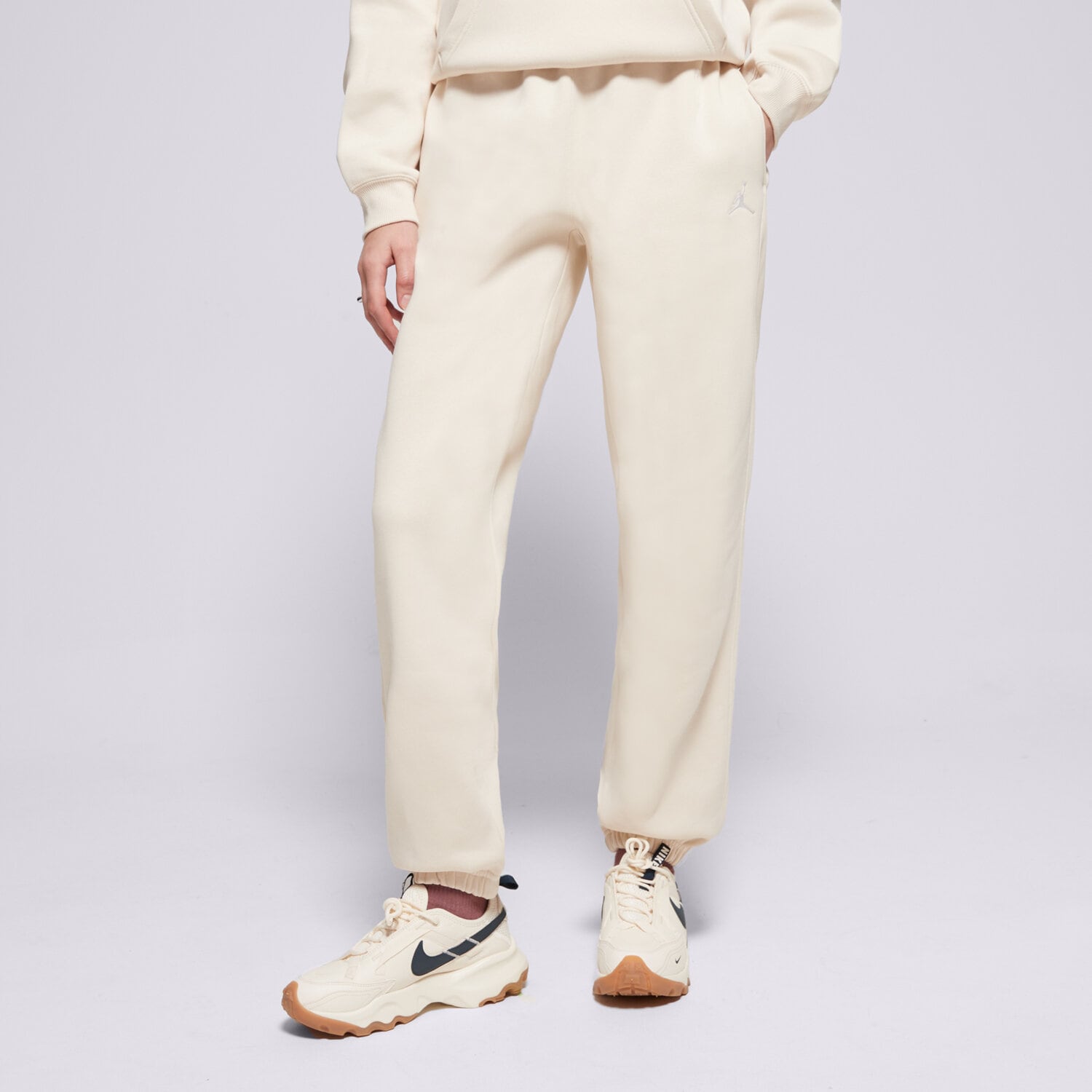 dámské kalhoty KALHOTY  W JORDAN BRKLN FLC PANT 24 FV7077-203 BÉŽOVÁ