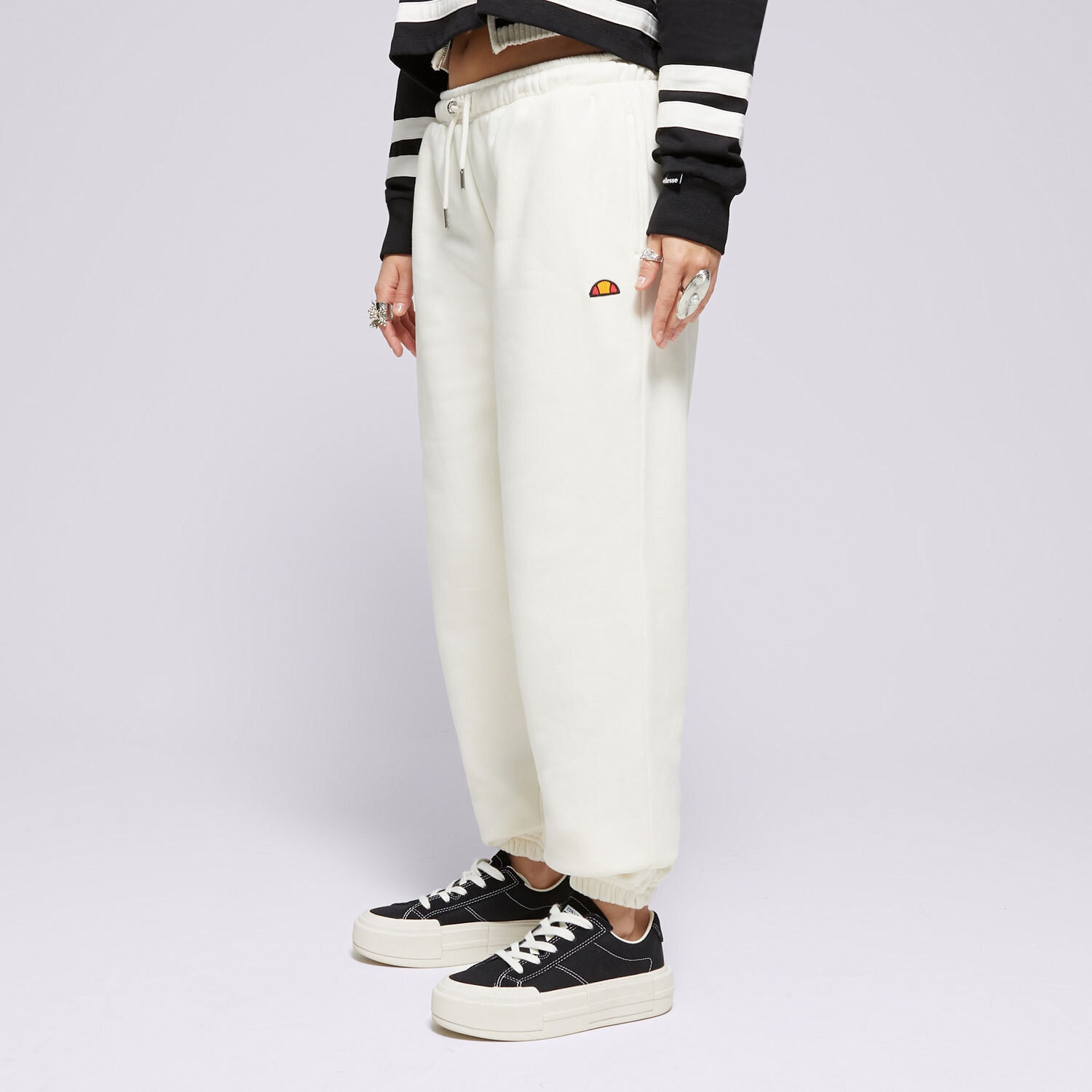 dámské kalhoty ELLESSE KALHOTY  MUGIA JOG PANT OFF WHT SMG22040904 BÉŽOVÁ