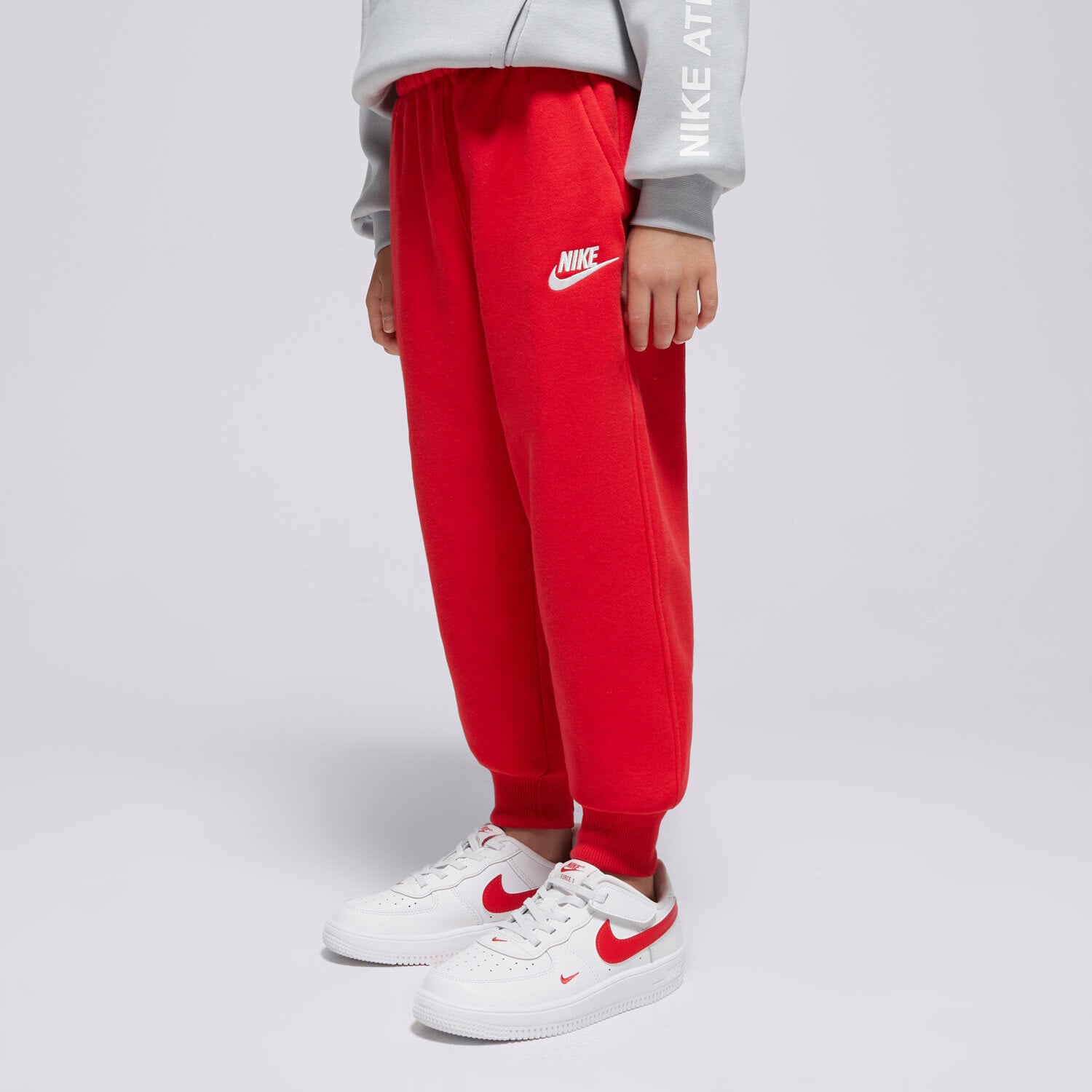 dětské kalhoty NIKE KALHOTY  K NSW CLUB FLC JGGR LBR BOY FD3008-657 ČERVENÁ