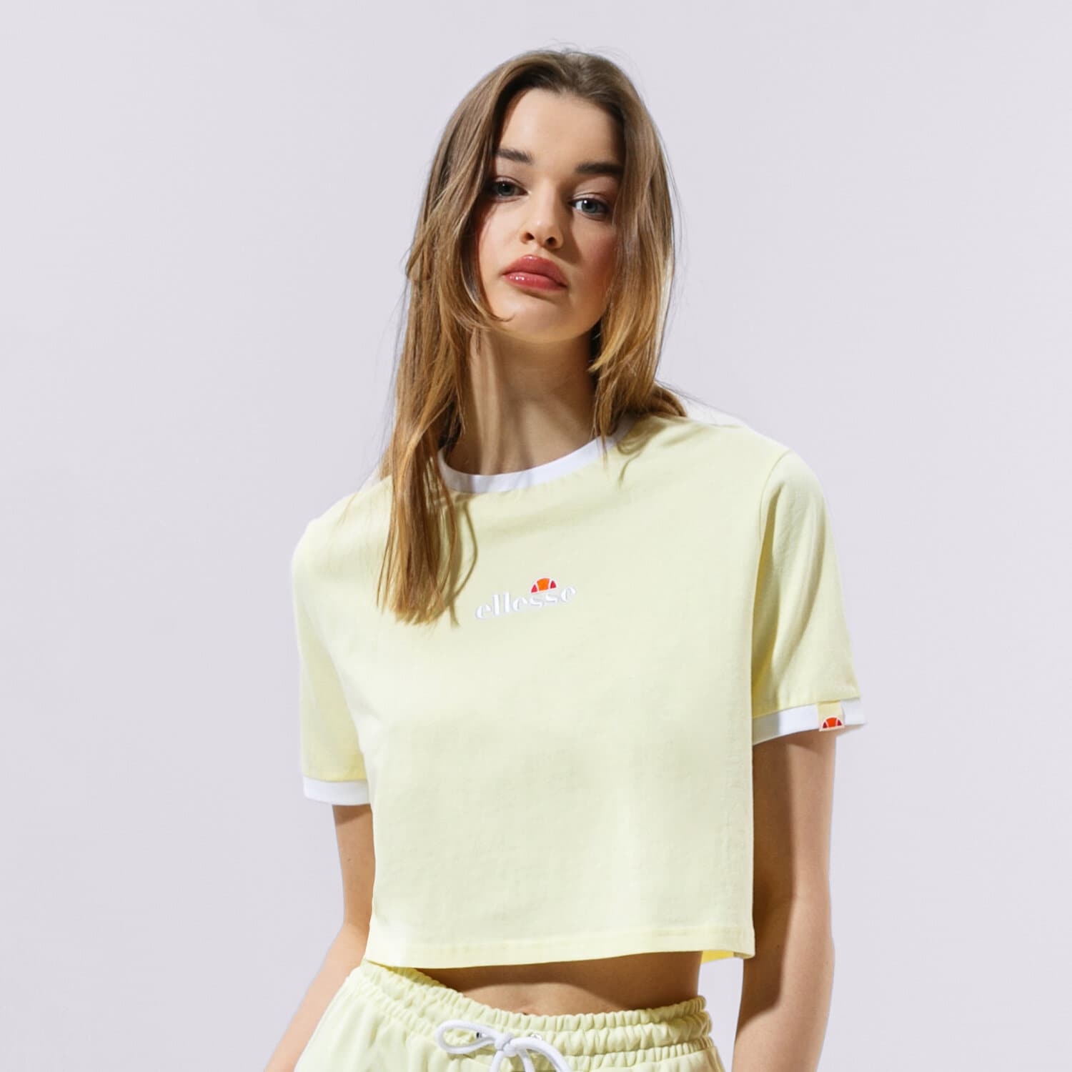 dámské tričko ELLESSE TRIČKO DERLA CROP TRIČKO LYELLOW SGJ11884603 ŽLUTÁ