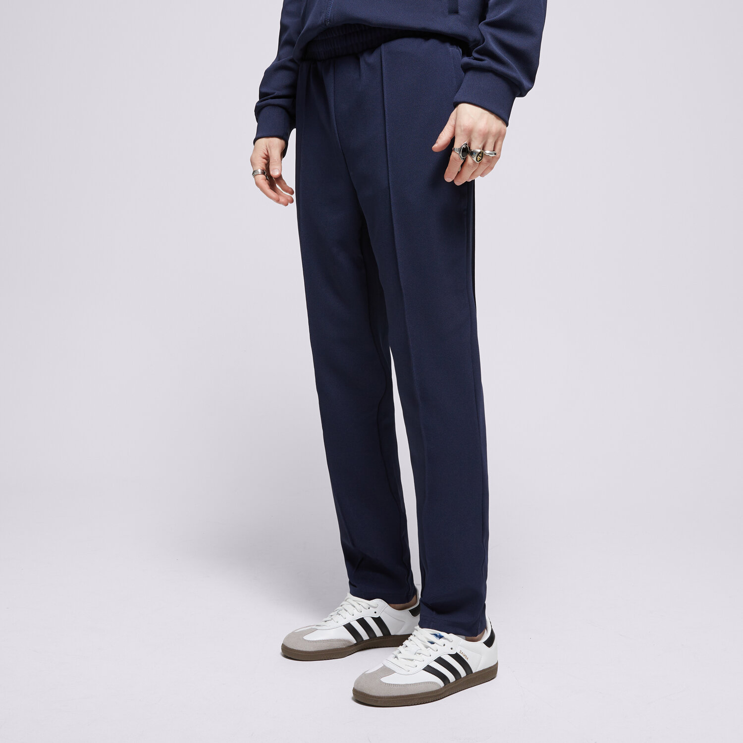 pánské kalhoty FILA KALHOTY  PIN TUCK SLIM LEG PANT FW24MH035410 TMAVOMODRÁ