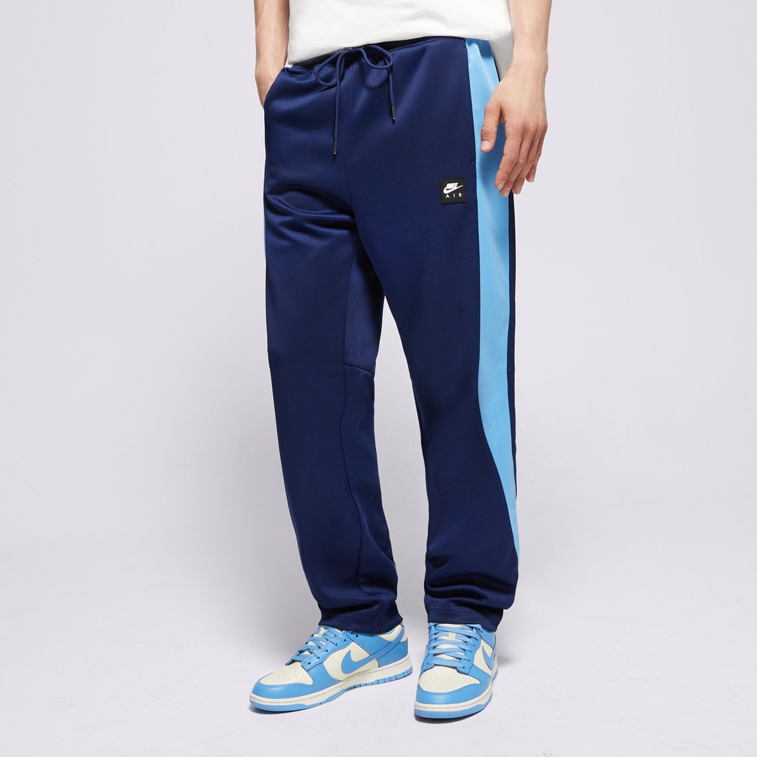pánské kalhoty NIKE KALHOTY  M NIKE AIR PK TRACK PANT HJ0283-492 TMAVOMODRÁ