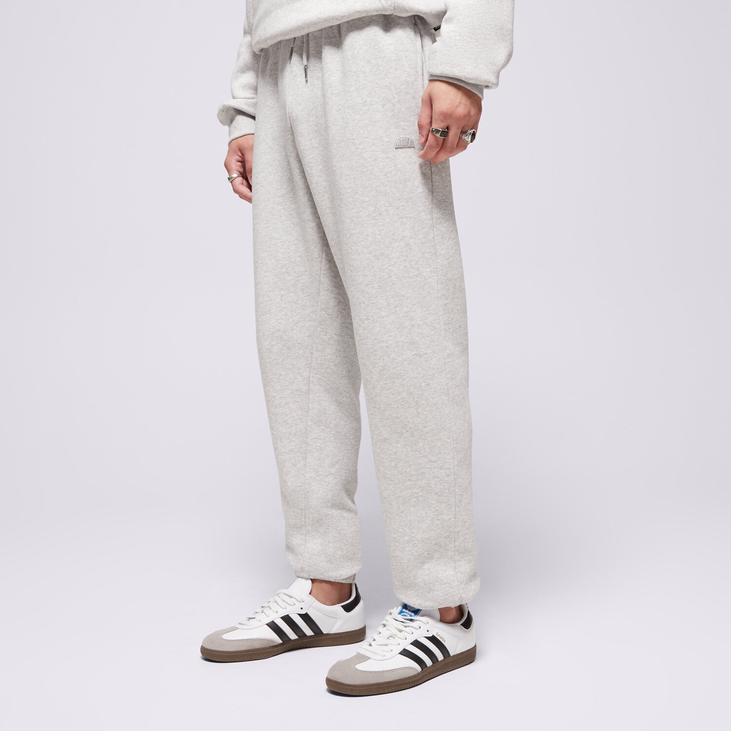 pánské kalhoty ELLESSE KALHOTY  LOMMA JOG PANT LGREY MRL SMG22038131 ŠEDÁ