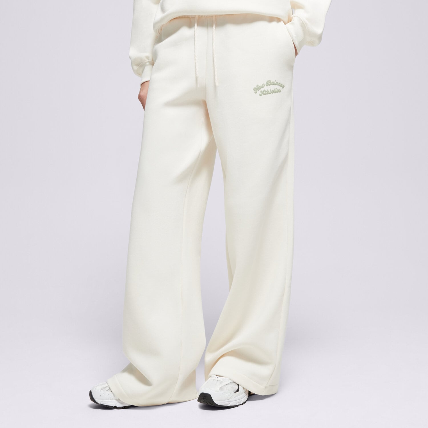 dámské kalhoty NEW BALANCE KALHOTY  LINEAR HERITAGE FLEECE WIDE LEG PANT WP53902PEF BÉŽOVÁ