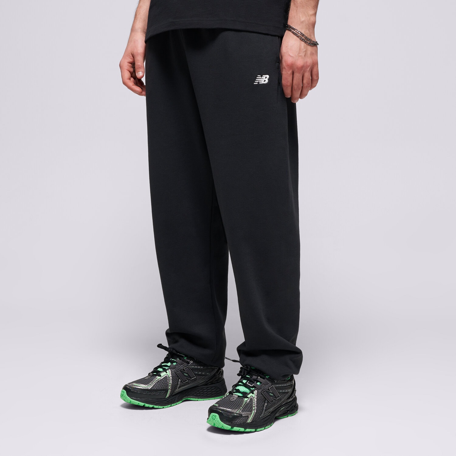 pánské kalhoty NEW BALANCE KALHOTY  SPORT ESSENTIALS FRENCH TERRY JOGGER MP41519BK ČERNÁ