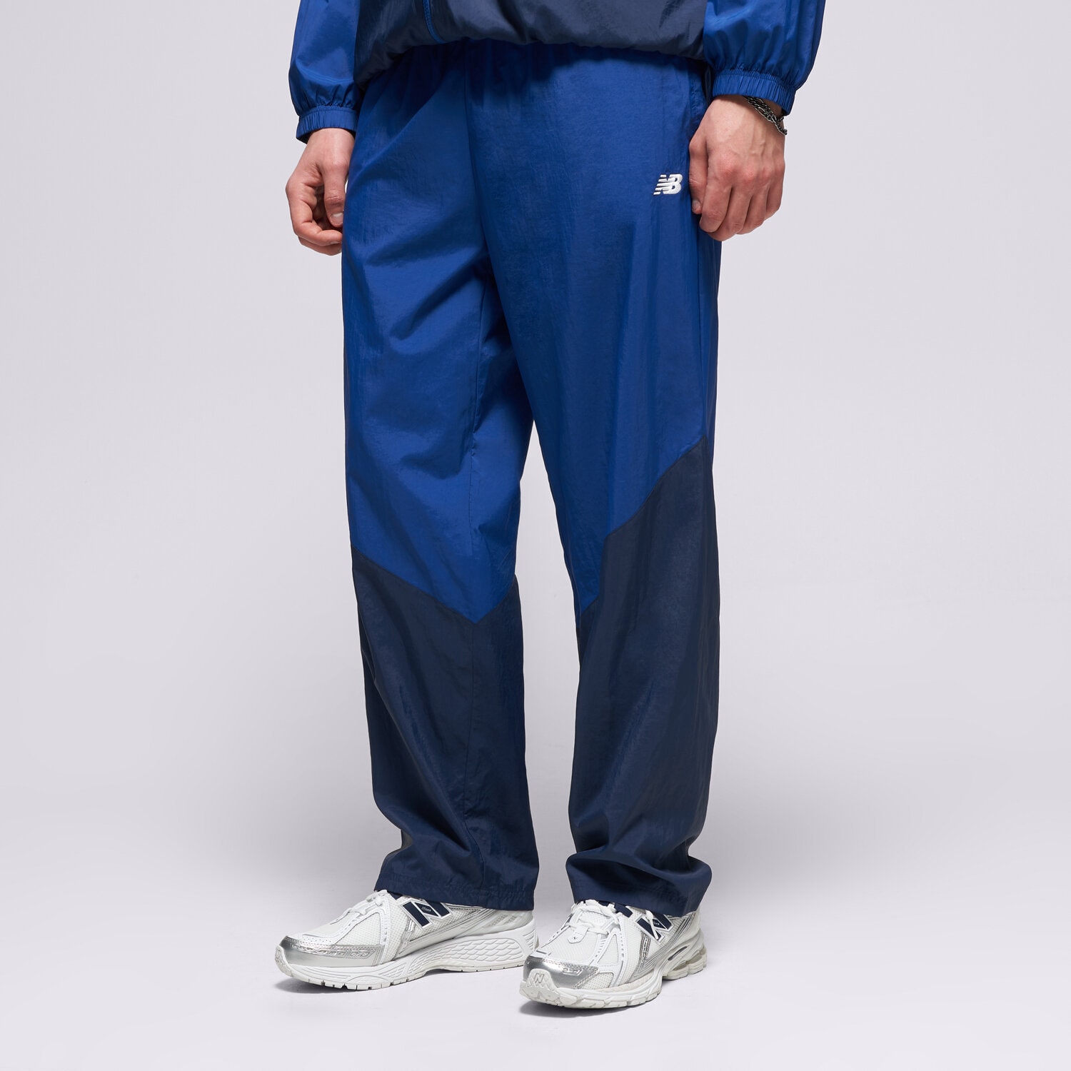 pánské kalhoty NEW BALANCE KALHOTY  SPORT LEGACY PANT MB61R010NNY TMAVOMODRÁ