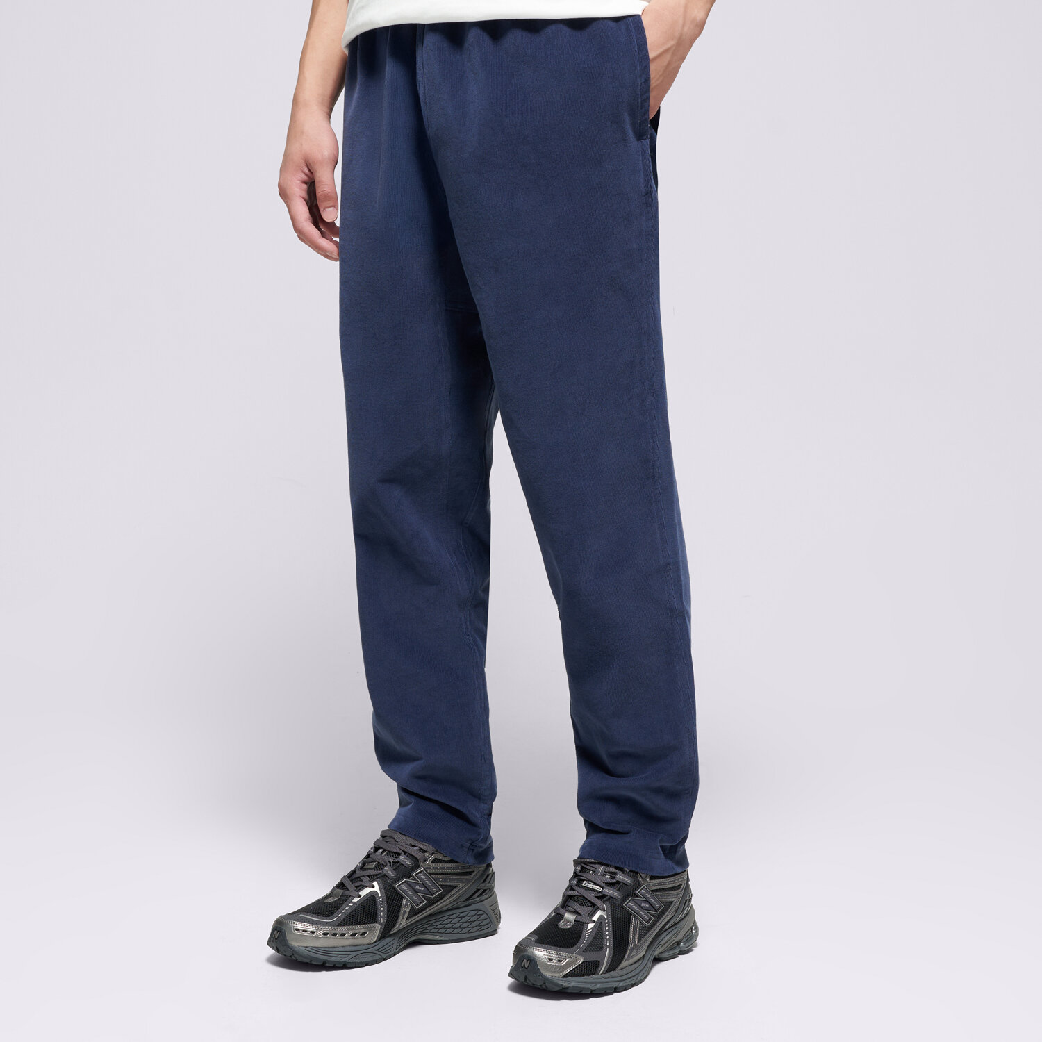pánské kalhoty NEW BALANCE KALHOTY  STRETCH CORDUROY PANT MP53521NNY TMAVOMODRÁ