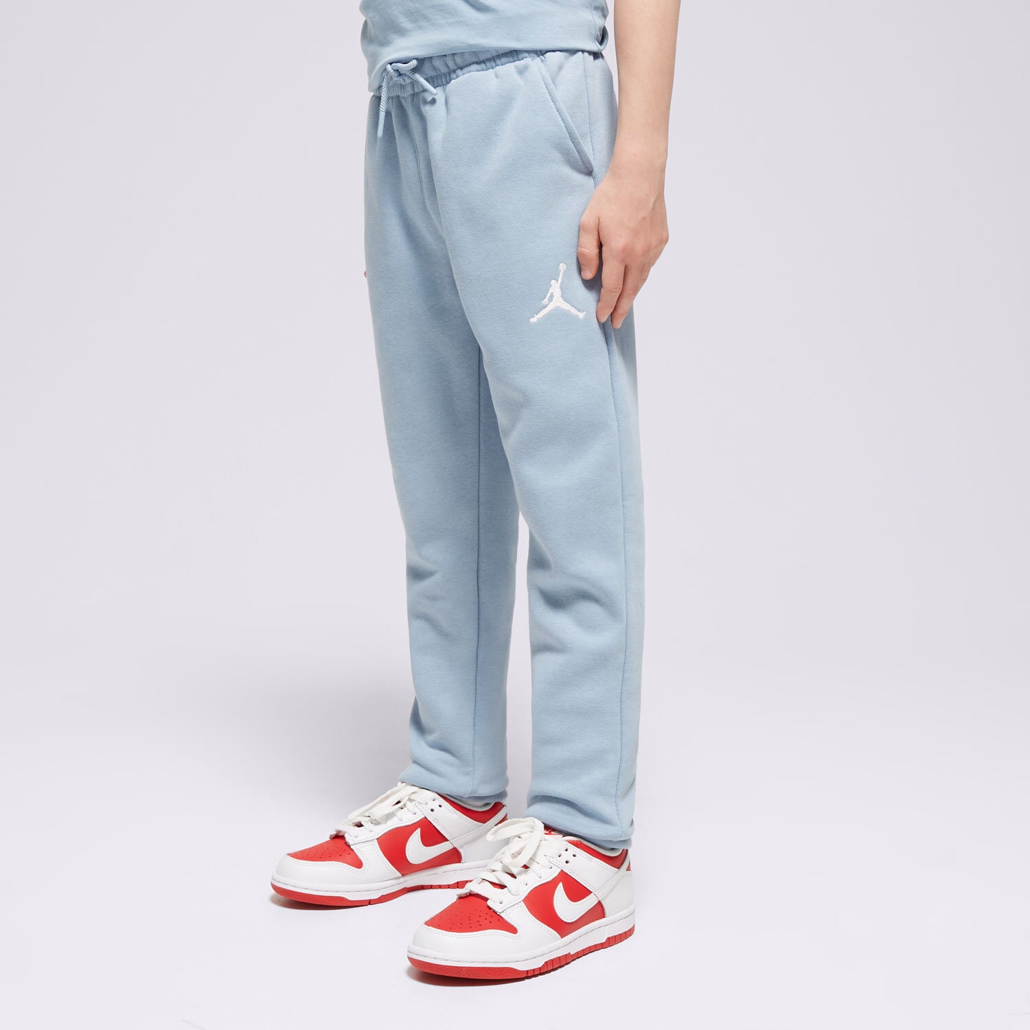dětské kalhoty JORDAN KALHOTY  MJ ESSENTIALS PANT B 95C549-B18 MODRÁ