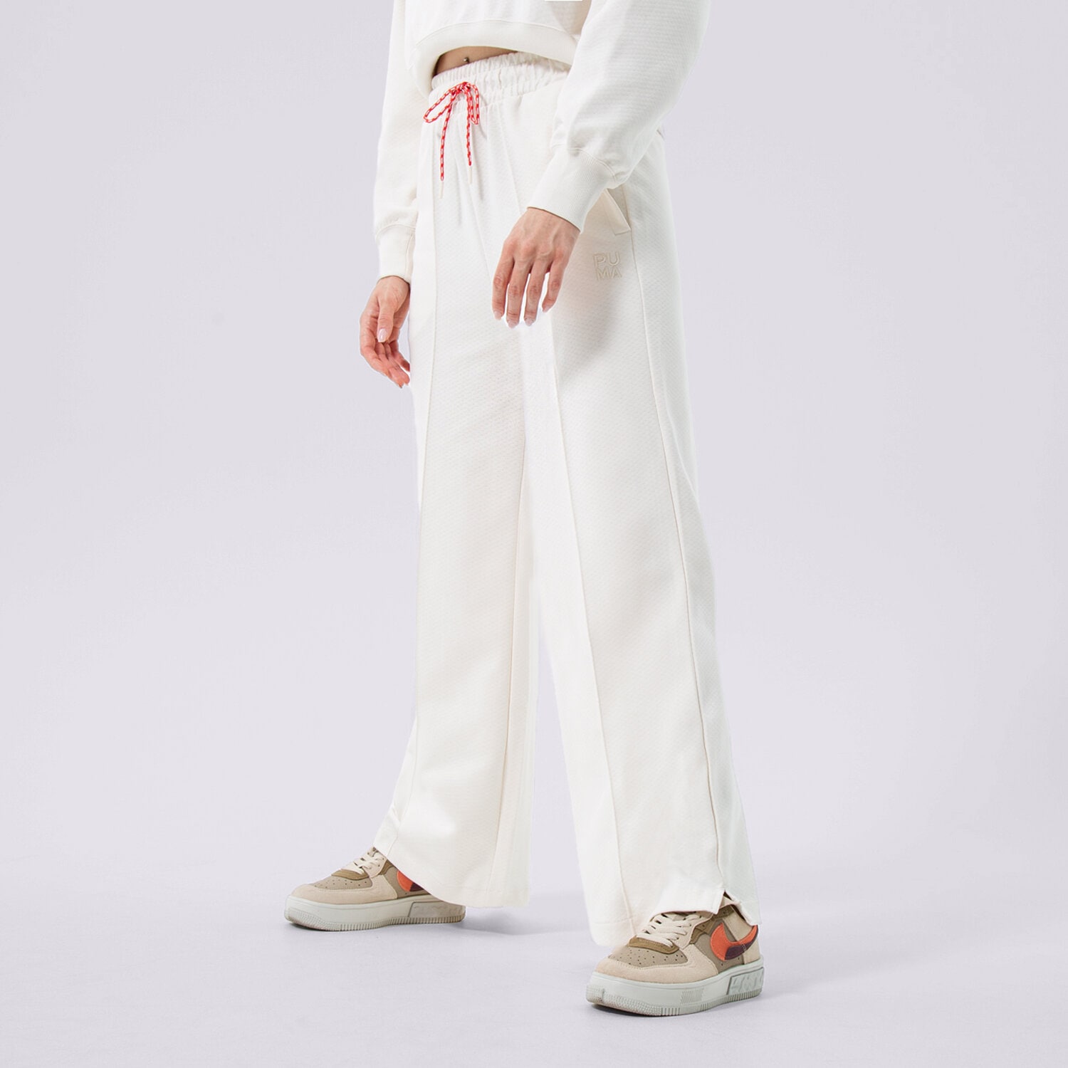 dámské kalhoty PUMA KALHOTY  PUMA INFUSE WIDE LEG PANTS DK 536740-65 BÉŽOVÁ