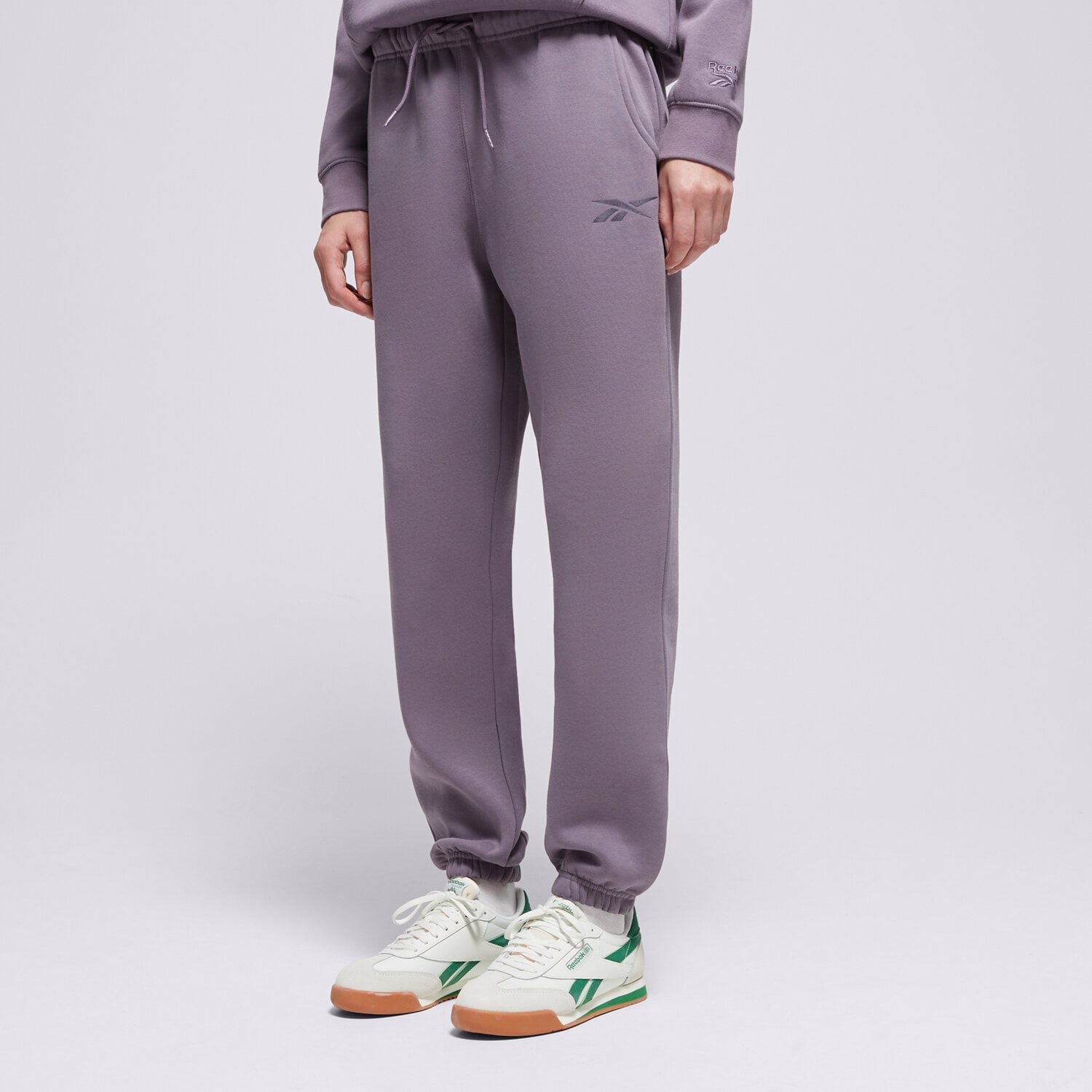 dámské kalhoty REEBOK KALHOTY  AMANDA ELASTICATED 100239799 FIALOVÁ