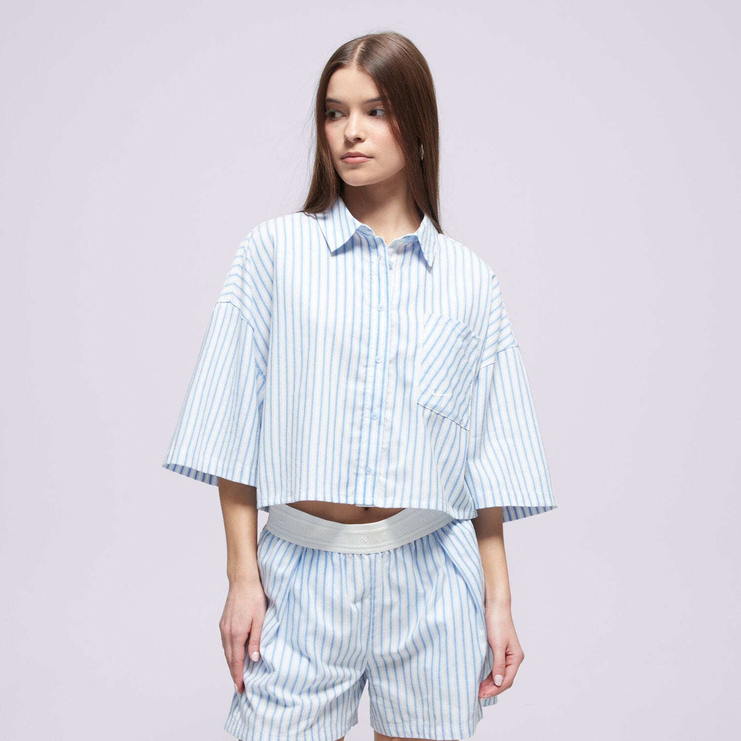 dámské tričko NIKE KOŠILE W NSW OFFLN WVN PPLN STRP SS II4228-435 MODRÁ