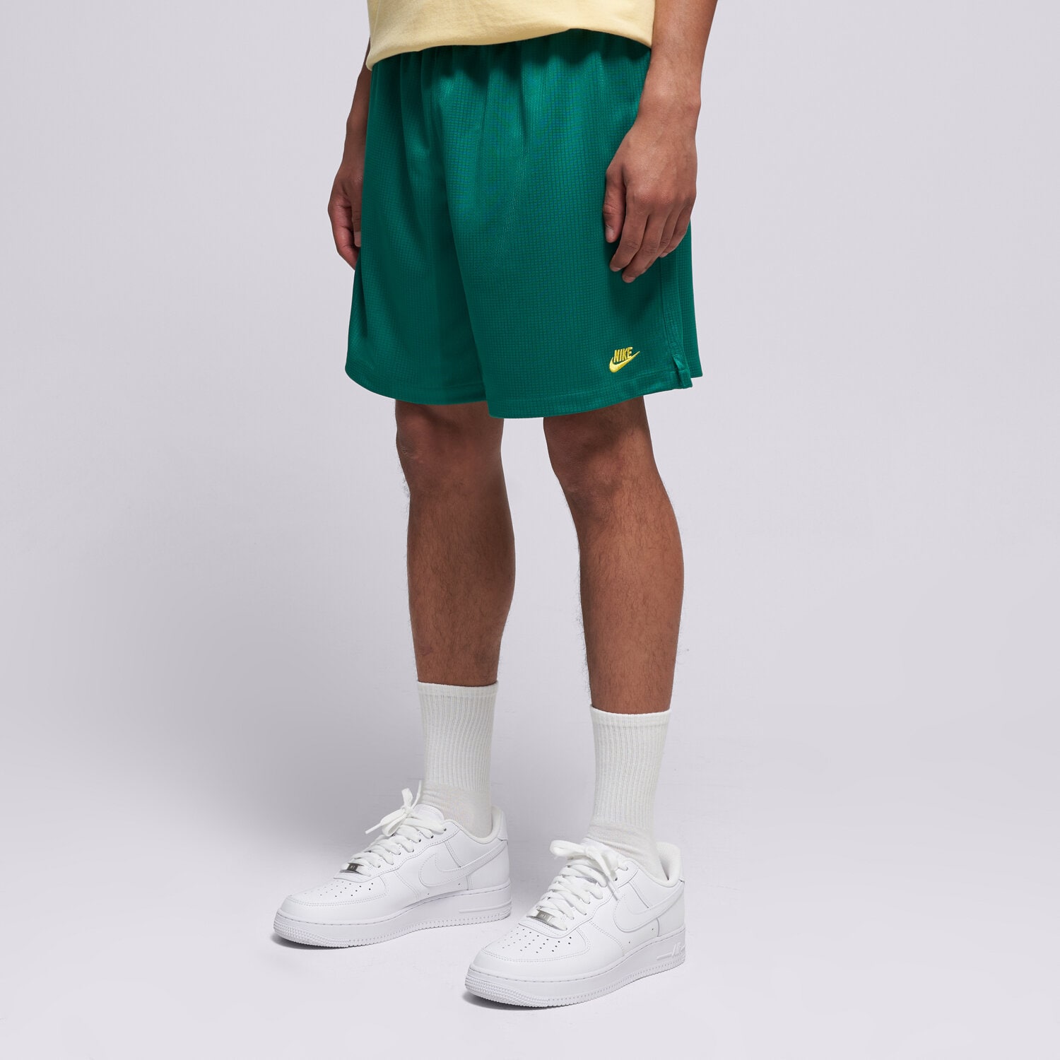pánské kraťasy NIKE ŠORTKY  M NK CLUB FLOW EMBSS FUTBOL II4373-365 ZELENÁ