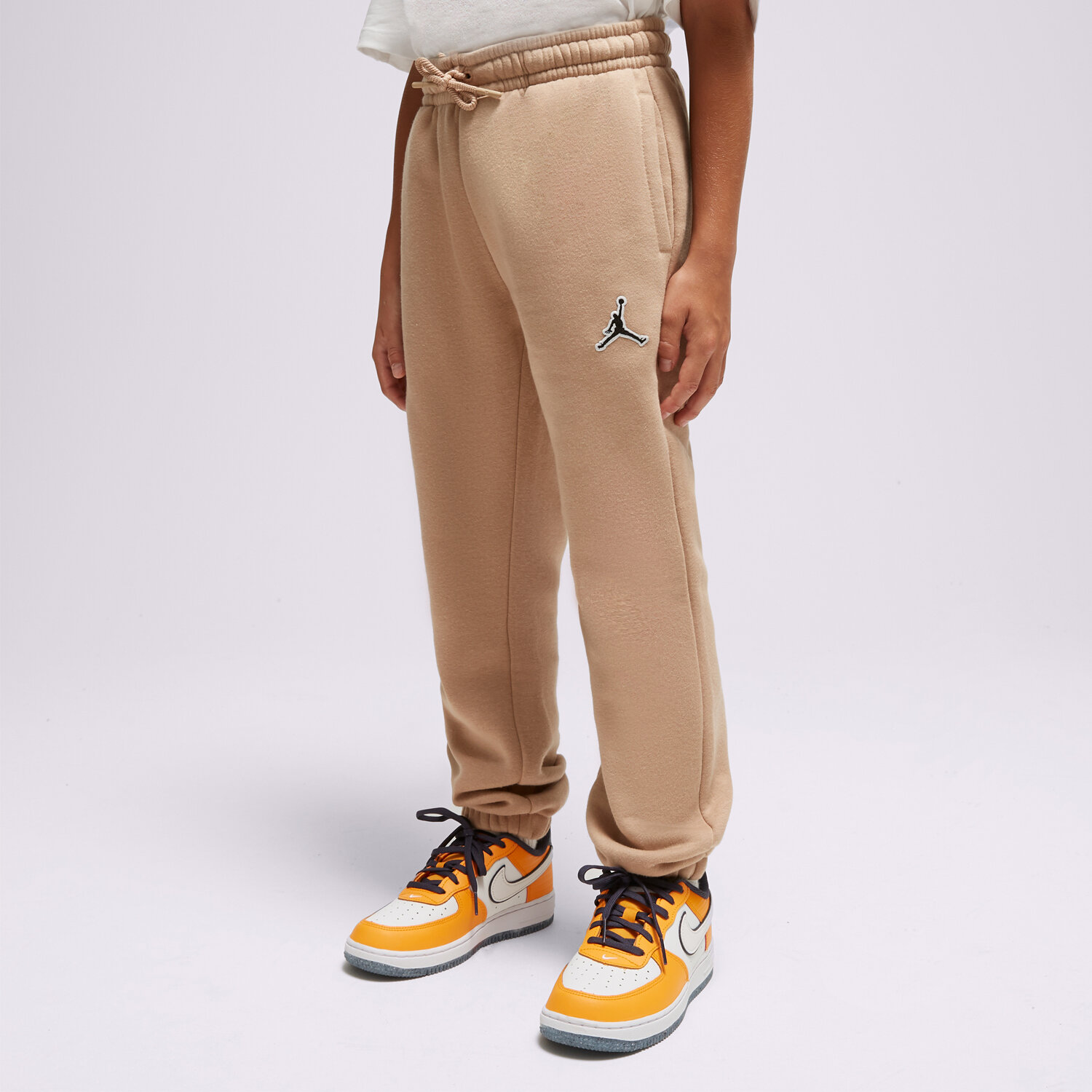 dětské kalhoty JORDAN KALHOTY  ESSENTIALS BOY 95A716-X0L BÉŽOVÁ