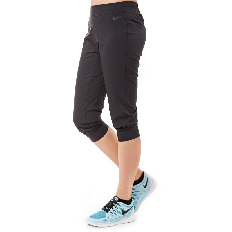 dámské kalhoty NIKE KALHOTY  WOVEN BLISS CAPRI 642528010 ČERNÁ