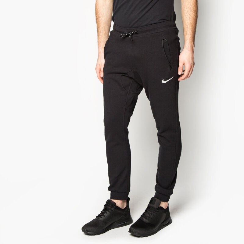 pánské kalhoty NIKE KALHOTY  AV15 CNVRSN FLC CUFF 679406010 ČERNÁ