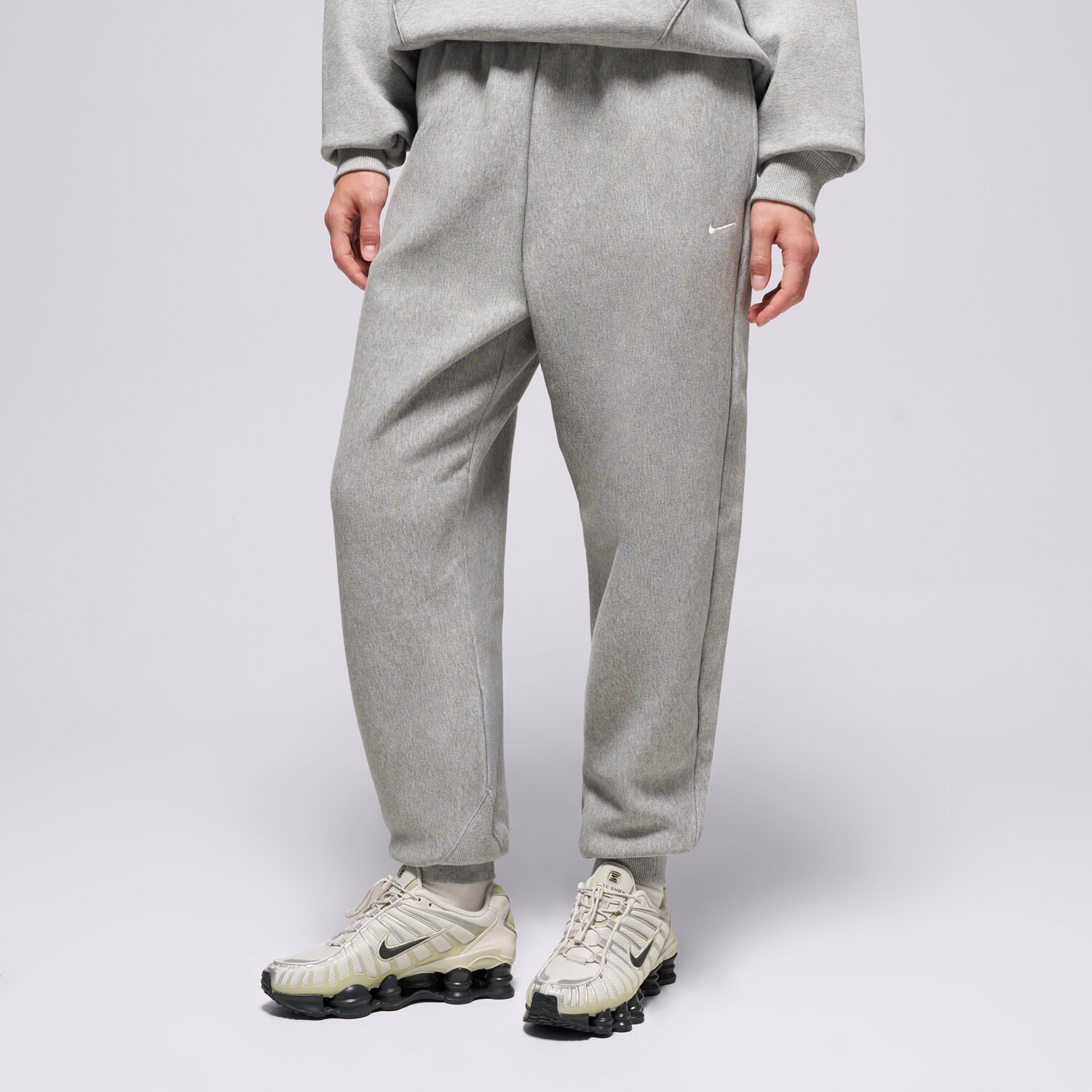 dámské kalhoty NIKE KALHOTY  W NK STDO OS JOGGER FLC HVY IO2109-063 ŠEDÁ