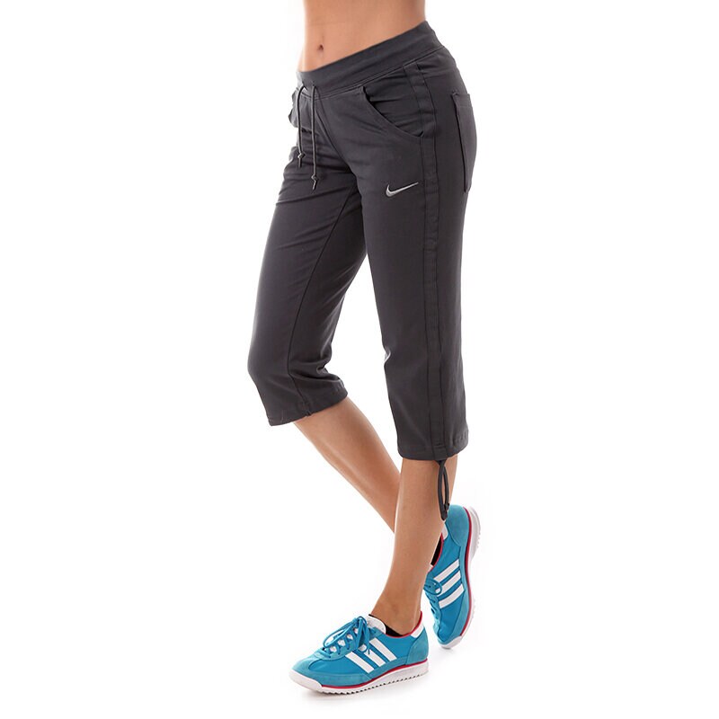 dámské kalhoty NIKE KALHOTY  NIKE CAPRI KNITTED WERE 579788060 ŠEDÁ