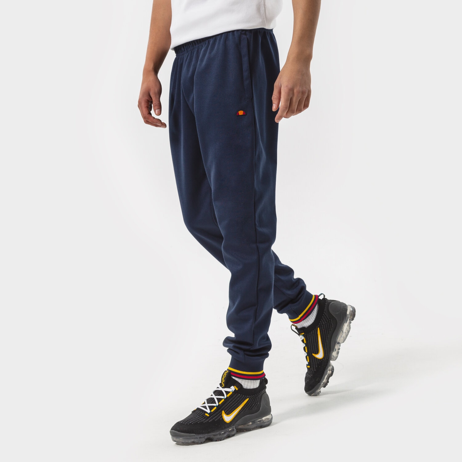 pánské kalhoty ELLESSE KALHOTY  DEYA TRACK PANT NAVY SHM14553429 TMAVOMODRÁ