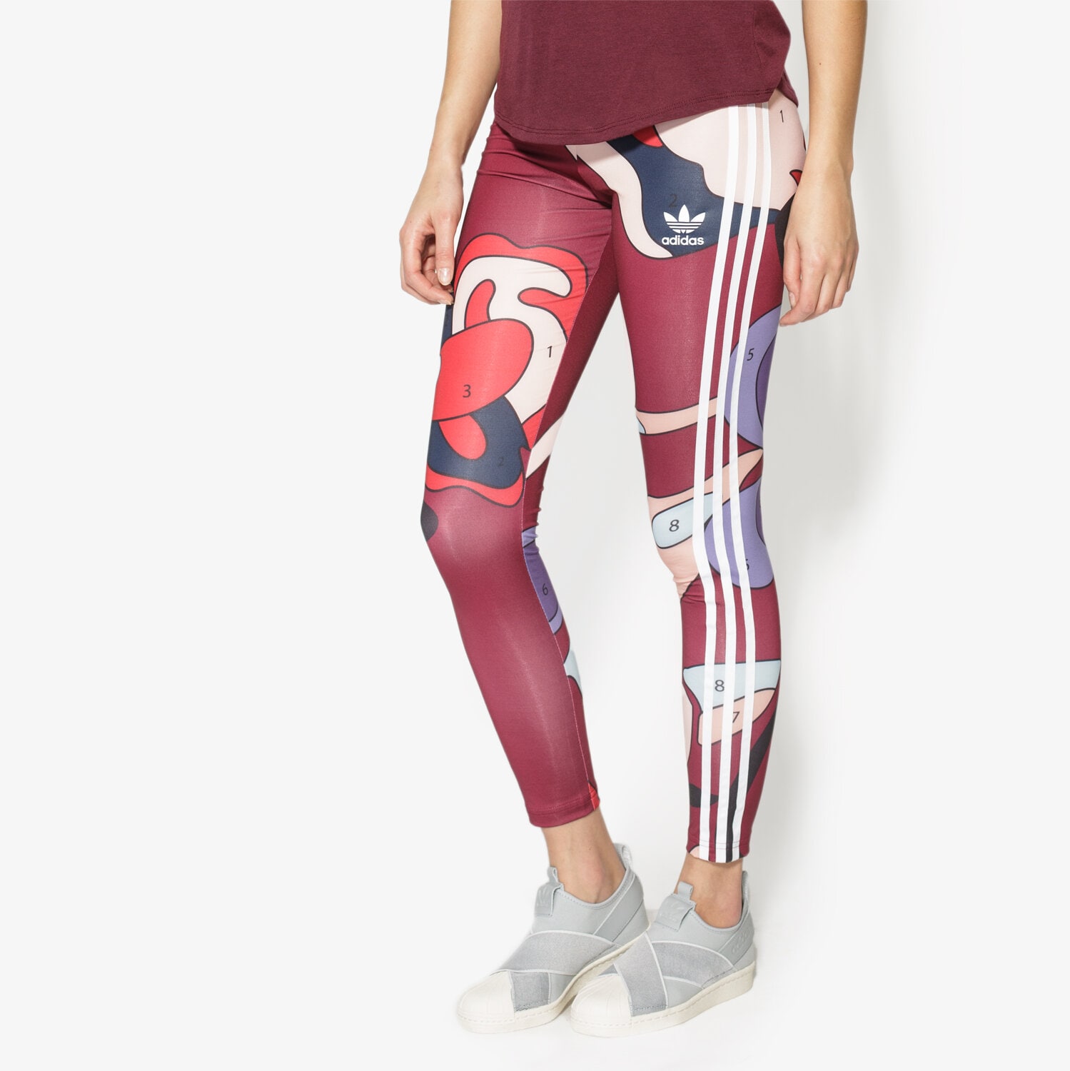 dámské kalhoty ADIDAS KALHOTY  RITA ORA AY7122 VÍCEBAREVNÁ