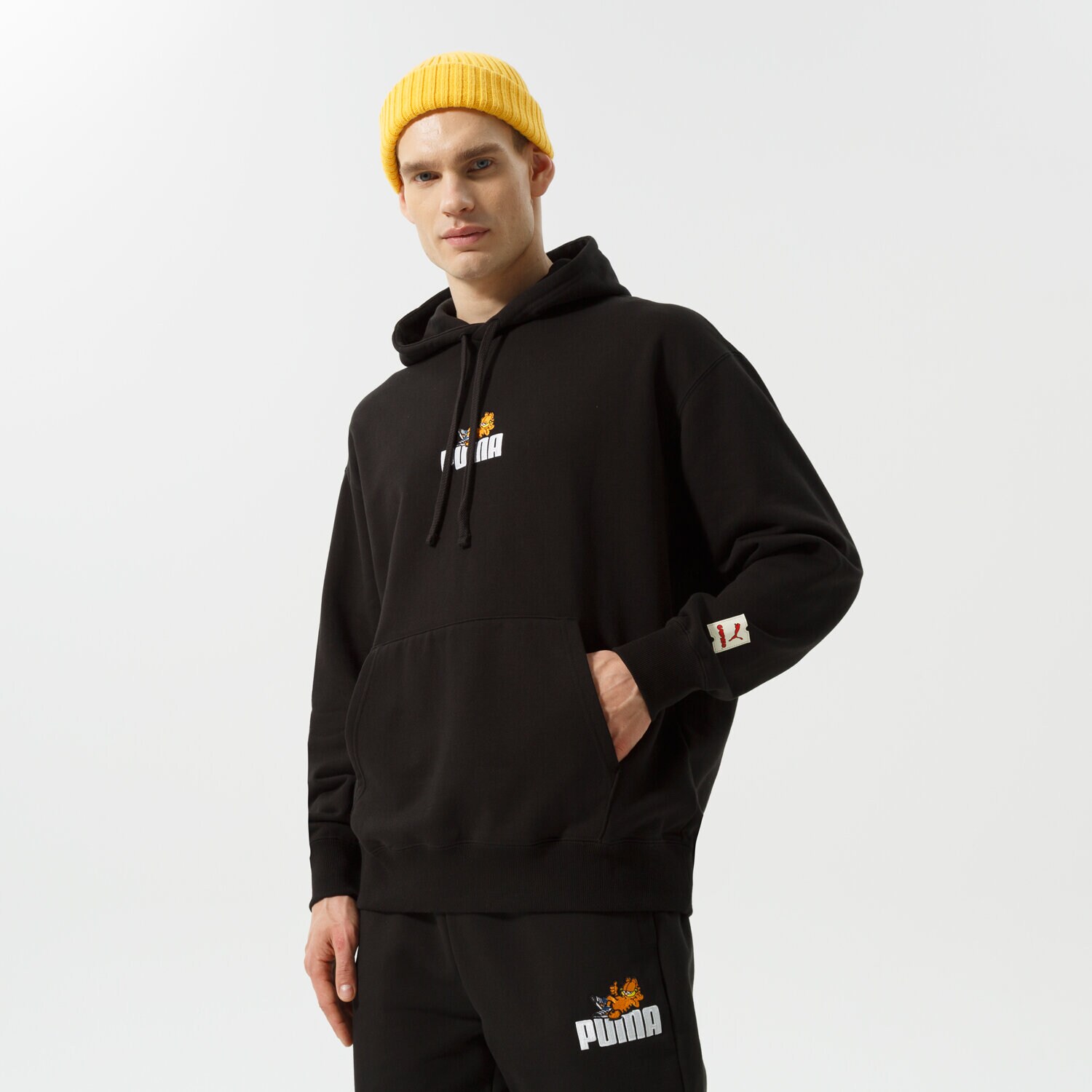 pánská mikina PUMA MIKINA S KAPUCÍ PUMA X GARFIELD HOODIE 534435 01 ČERNÁ