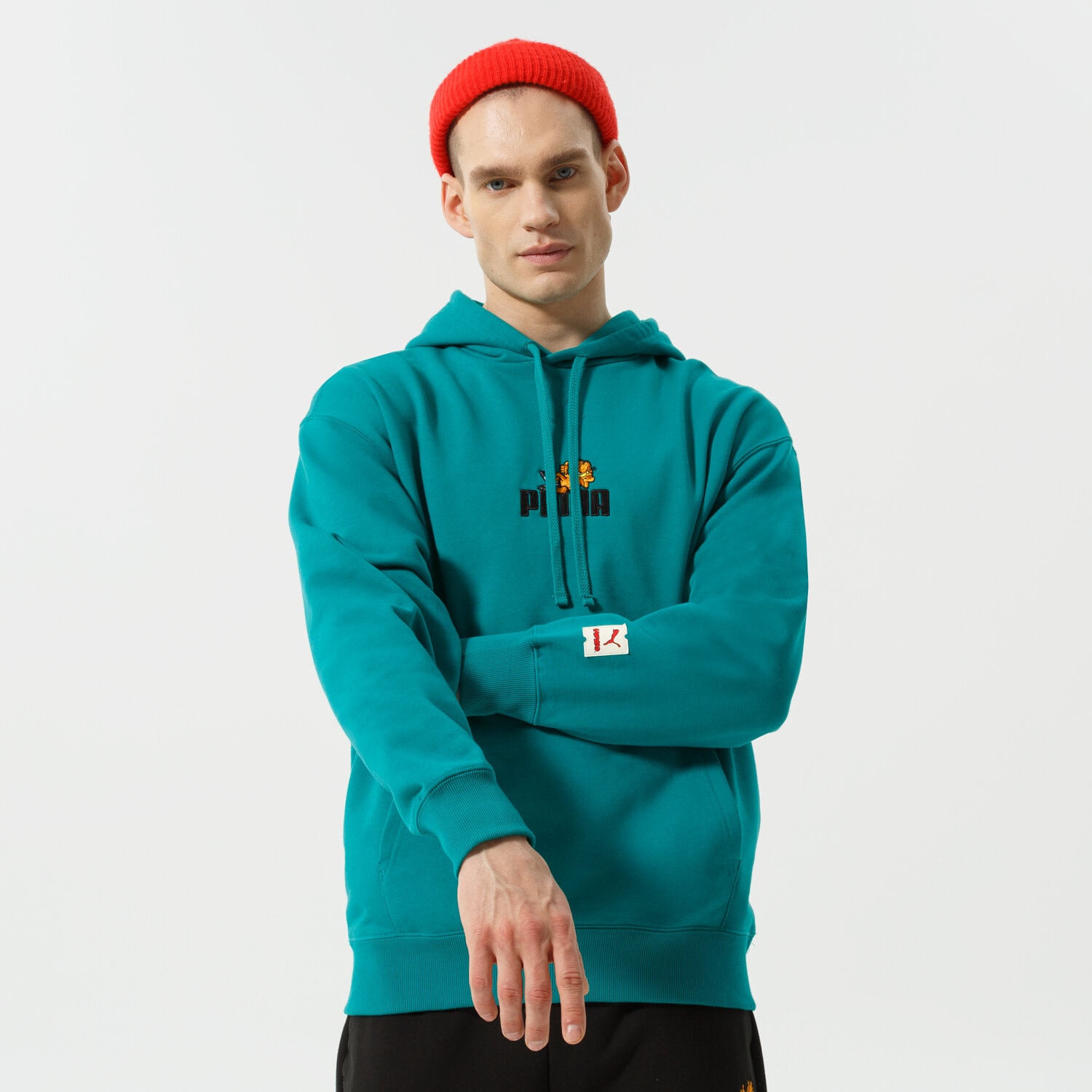 pánská mikina PUMA MIKINA S KAPUCÍ PUMA X GARFIELD HOODIE 534435 86 ZELENÁ