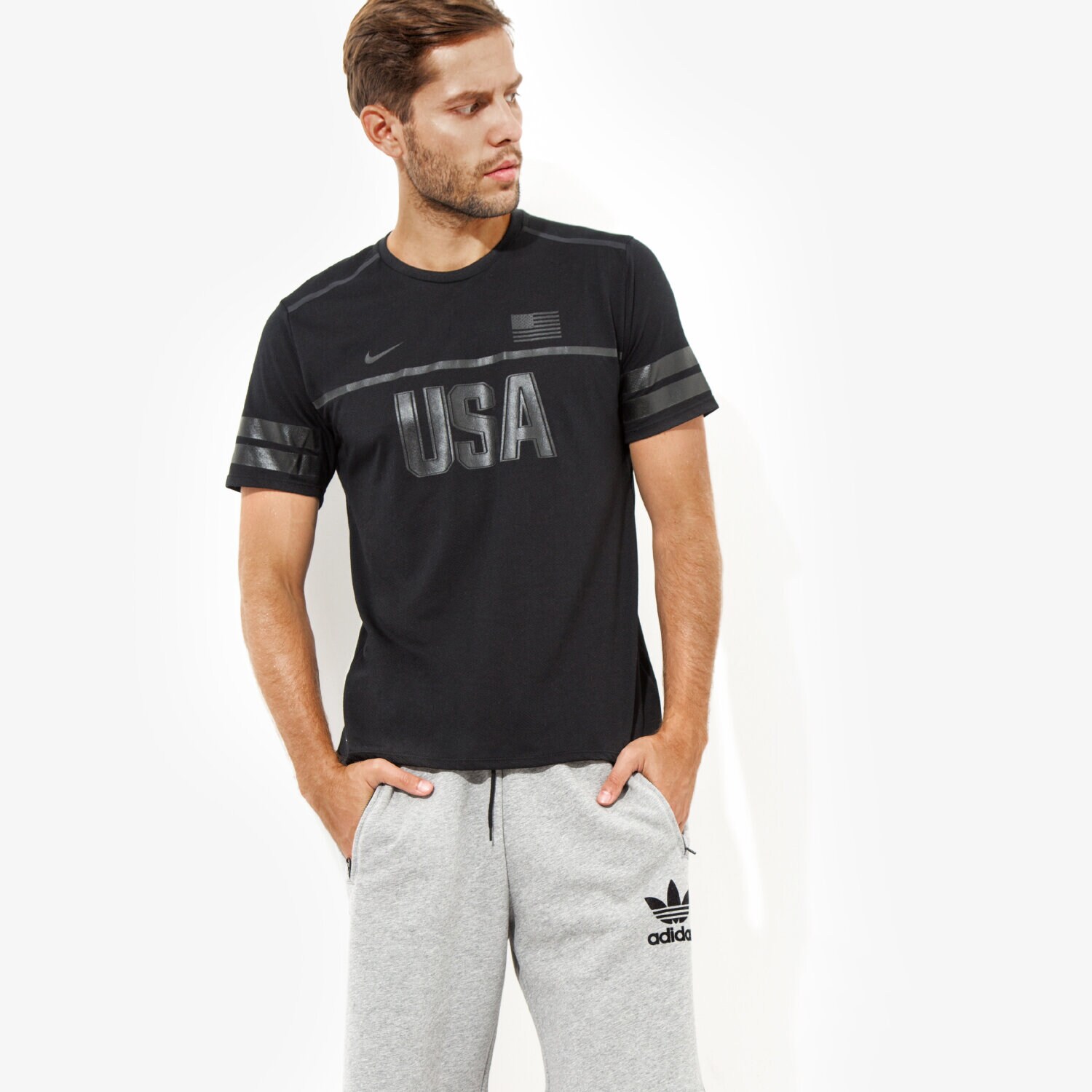 pánské tričko NIKE TRIČKO M NK DRY TOP SS ENERGY USA 812031010 ČERNÁ