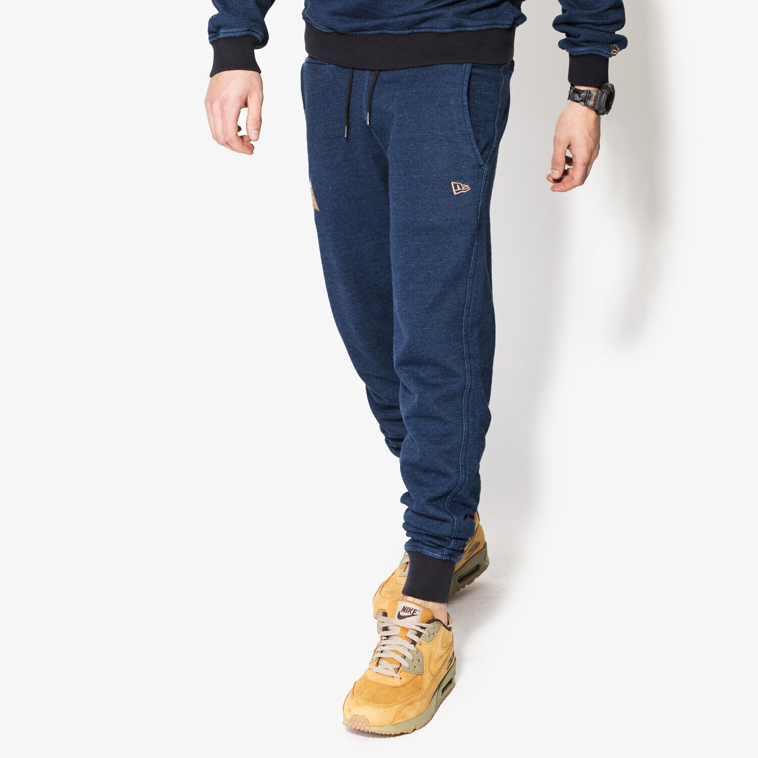 pánské kalhoty NEW ERA KALHOTY  CRAFTED TRACK PANT NE 11351563 TMAVOMODRÁ