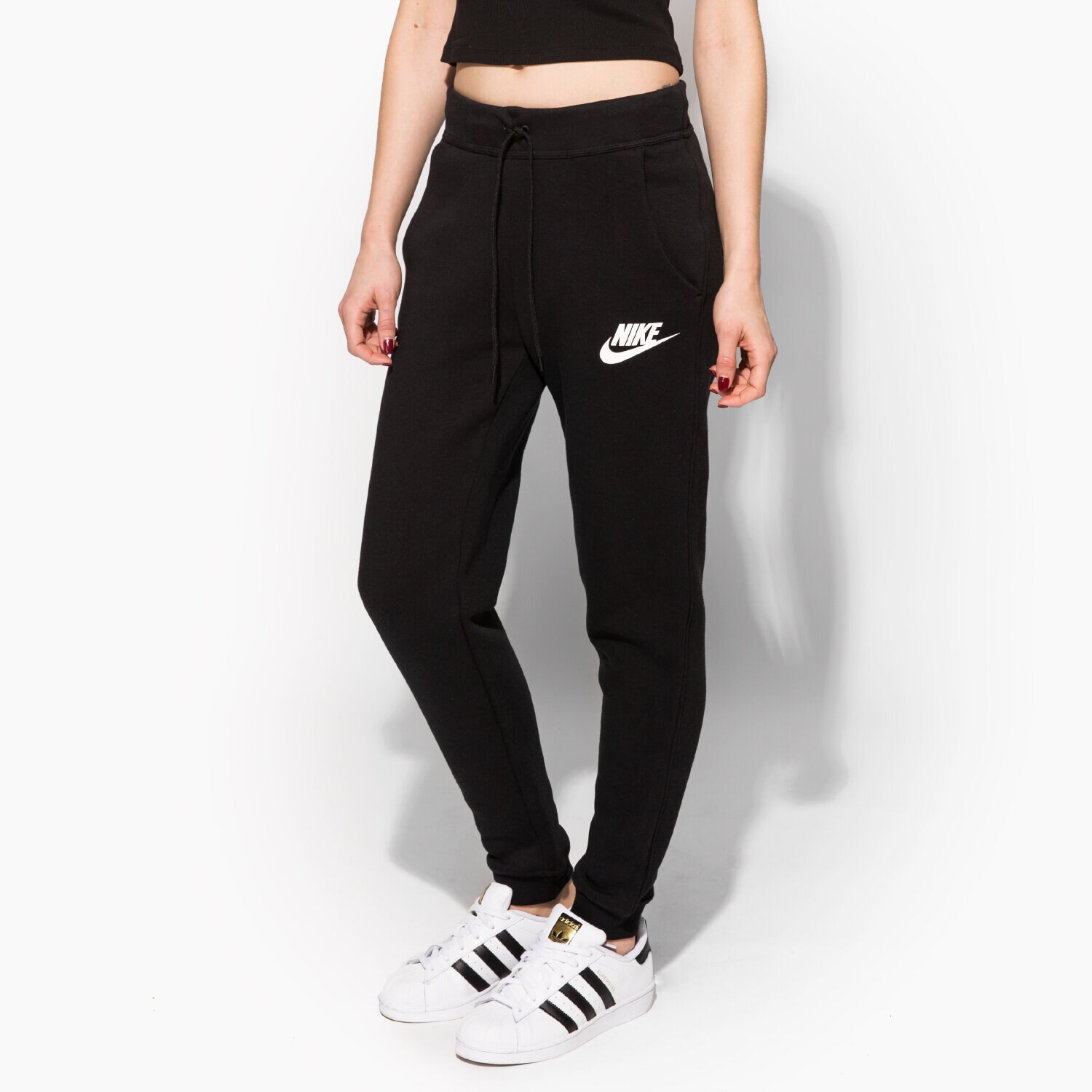 dámské kalhoty NIKE KALHOTY  RALLY PANT REG 828605010 ČERNÁ