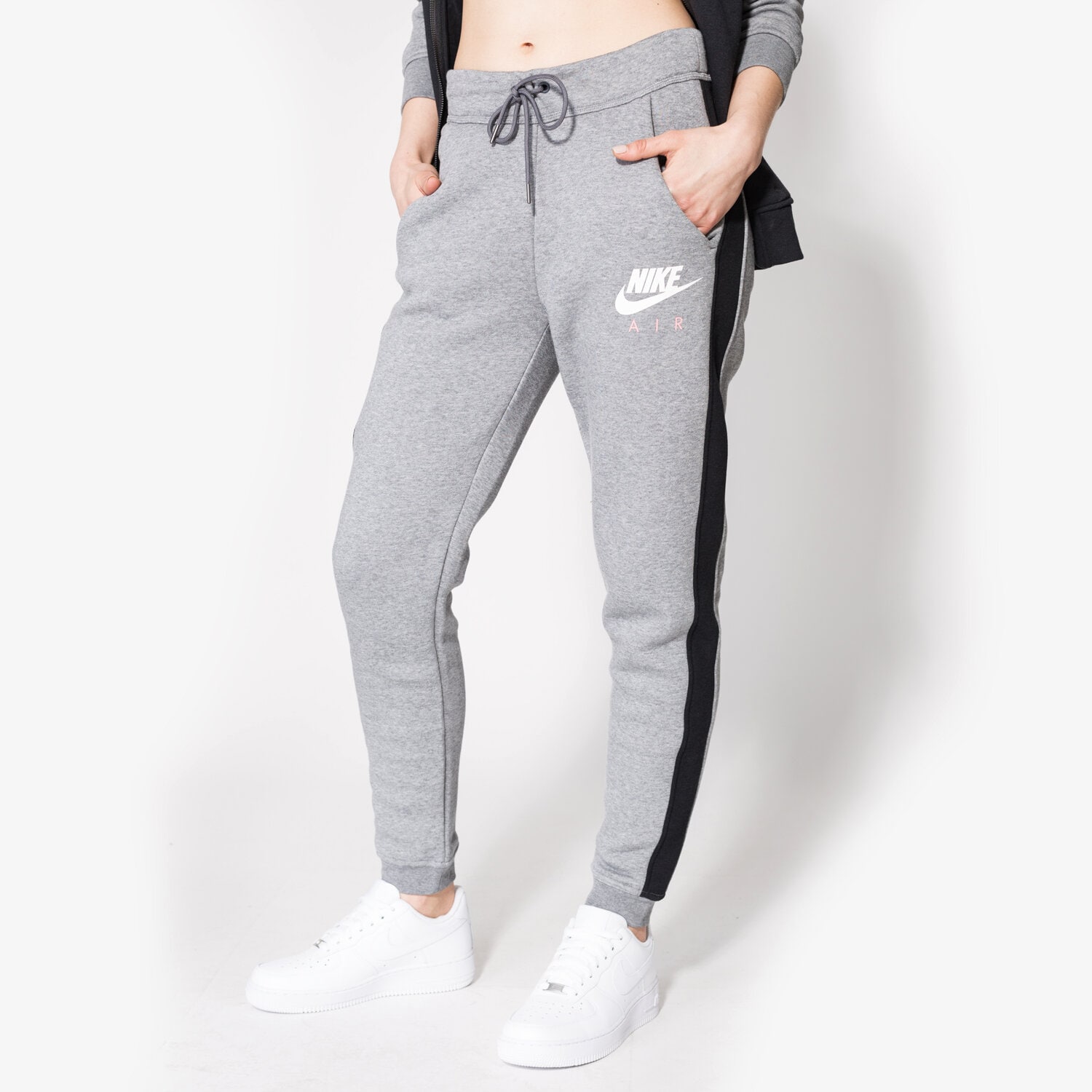 dámské kalhoty NIKE KALHOTY  NSW RALLY PANT REG AIR 856865091 ŠEDÁ