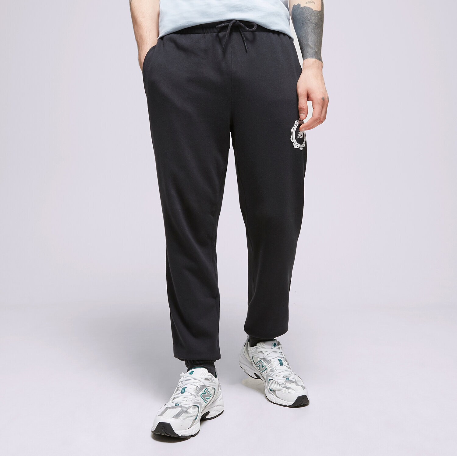 pánské kalhoty NEW BALANCE KALHOTY  NB SPORT SEASONAL MP31902 ČERNÁ