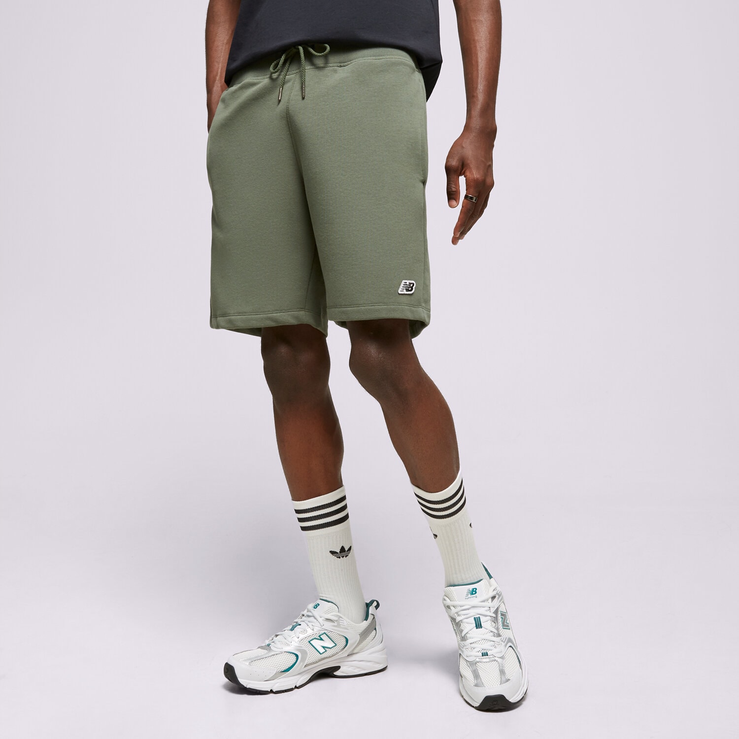 pánské kraťasy NEW BALANCE ŠORTKY  SSMALL LOGO SHORTS MS23600DON ZELENÁ