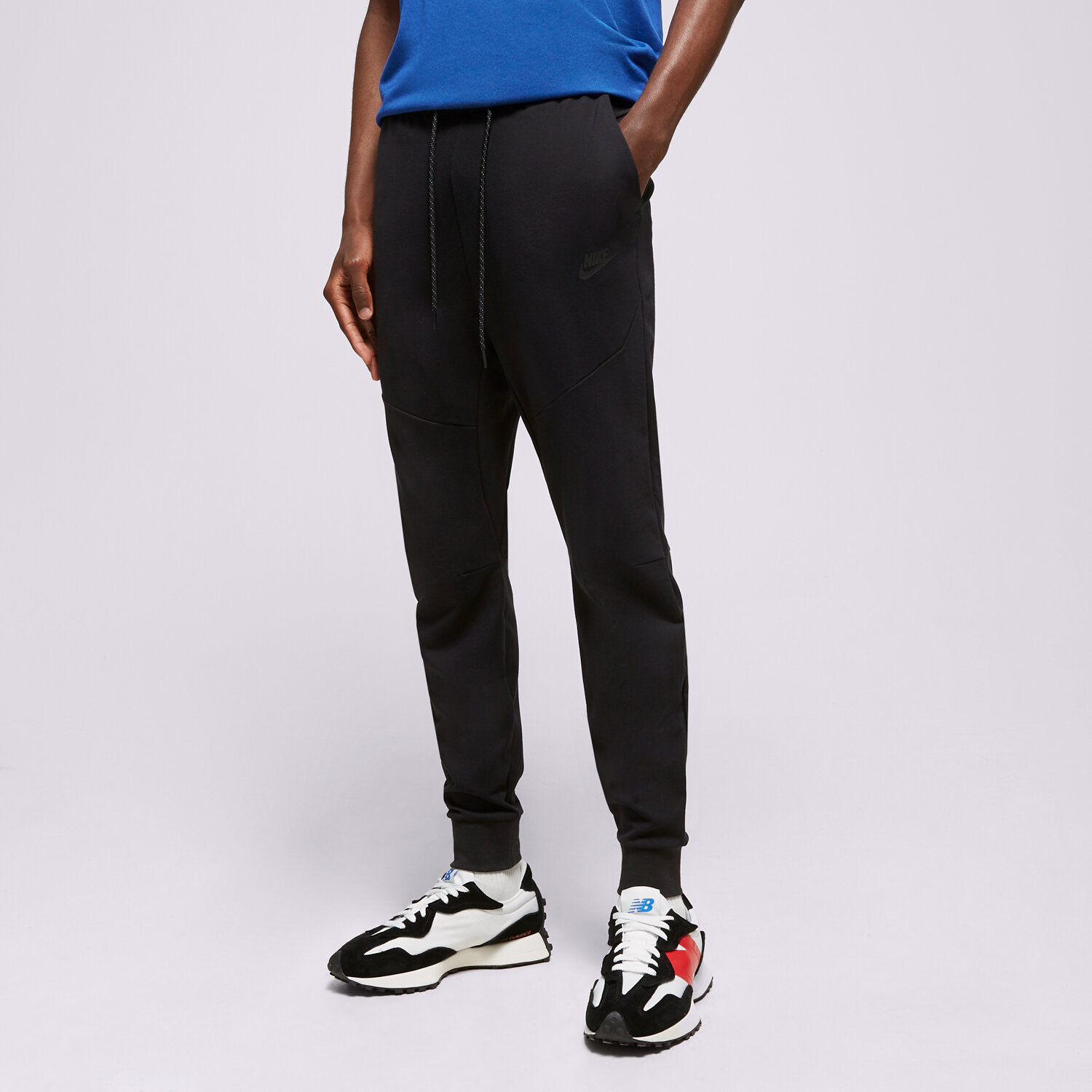 pánské kalhoty NIKE KALHOTY  M NK TECH LGHTWHT JGGR DX0826-010 ČERNÁ