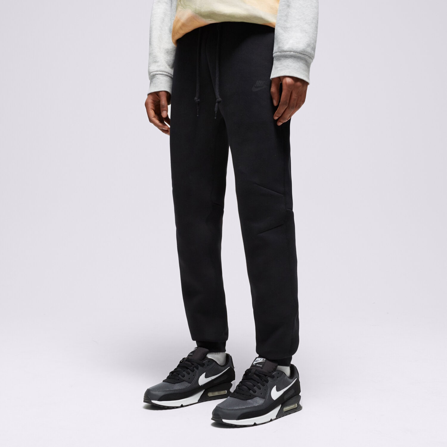 pánské kalhoty NIKE KALHOTY  M NK TCH FLC JGGR FB8002-010 ČERNÁ