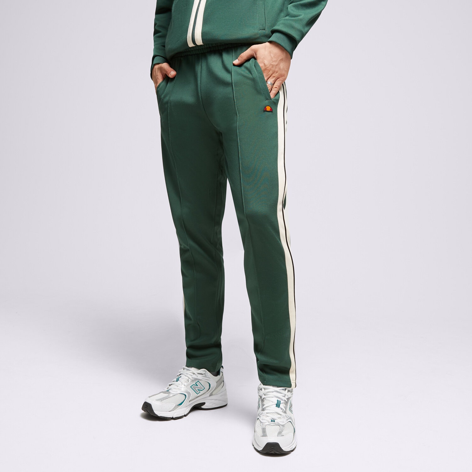 pánské kalhoty ELLESSE KALHOTY  LUXOR TRACK PANT DGREEN SHT19004502 ZELENÁ