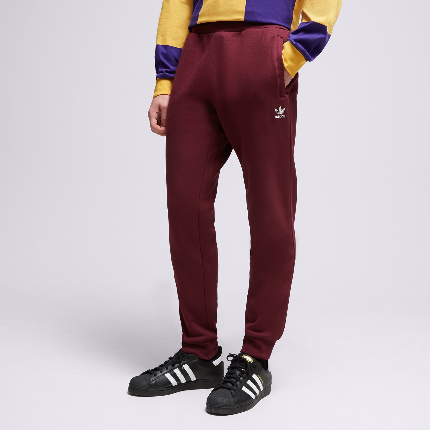 pánské kalhoty ADIDAS KALHOTY  ESSENTIALS PANT IM2099 BORDOVÁ