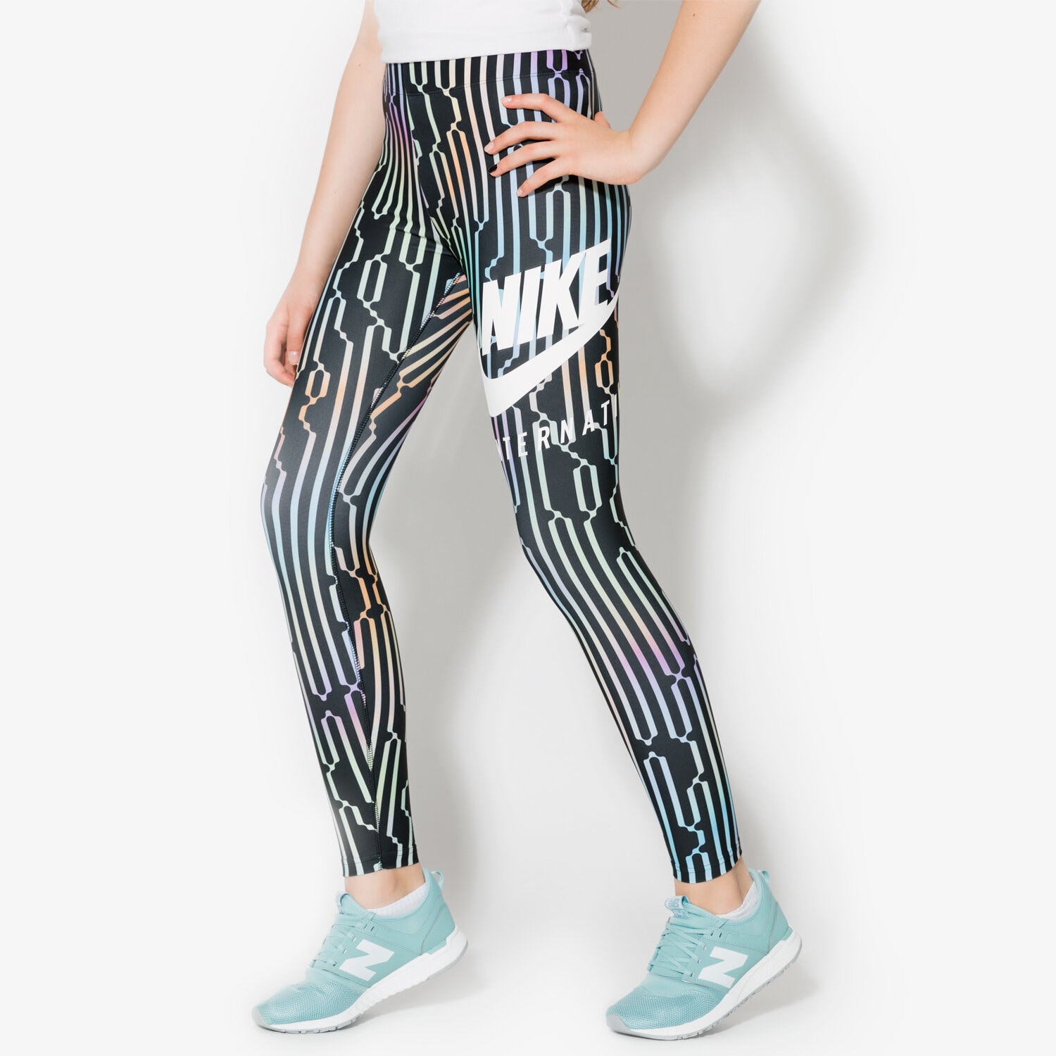 dámské kalhoty NIKE LEGGINGS W NK INTL LGGNG AOP 881176010 VÍCEBAREVNÁ