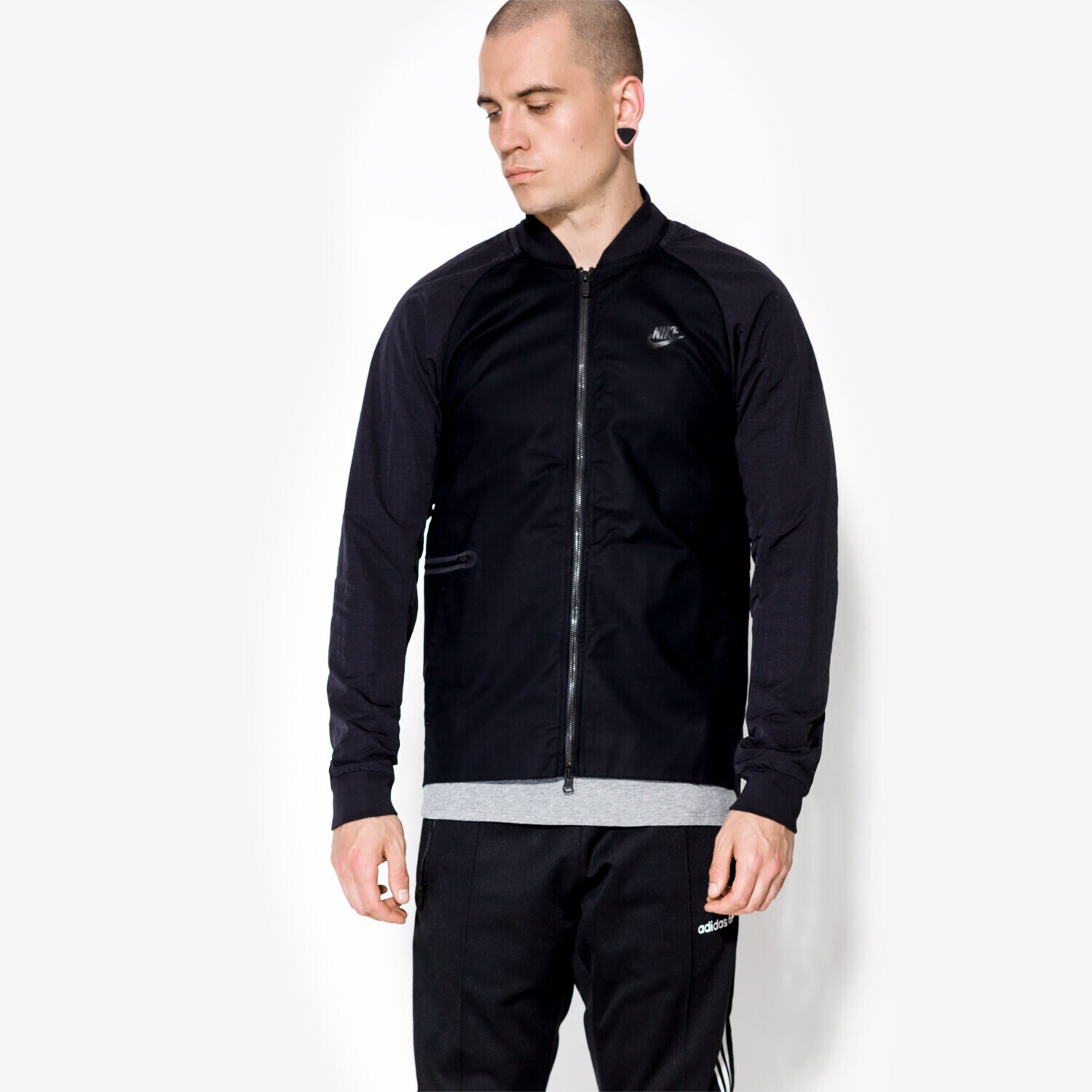 Přechodná bunda pánská (podzimní, jarní) NIKE BUNDA SOFTSHEL VRSTY JKT WVN 832192010 ČERNÁ